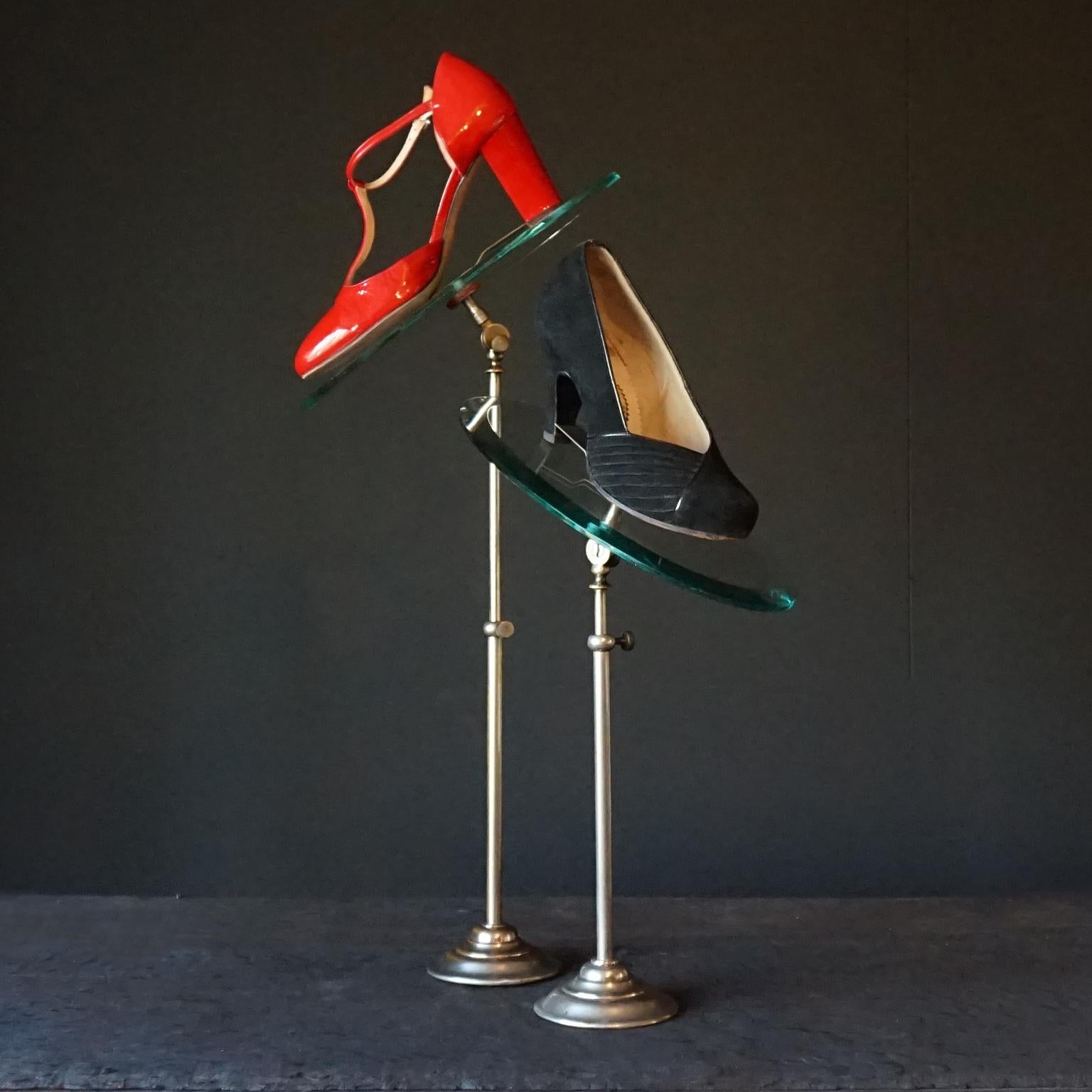 Very pretty set of 1920s Art Deco French department store counter display stands for shoes. Would be great to display your favourite pair on in your dressing room or walk-in closet.

The chrome stands are adjustable in height from 30-60 cm