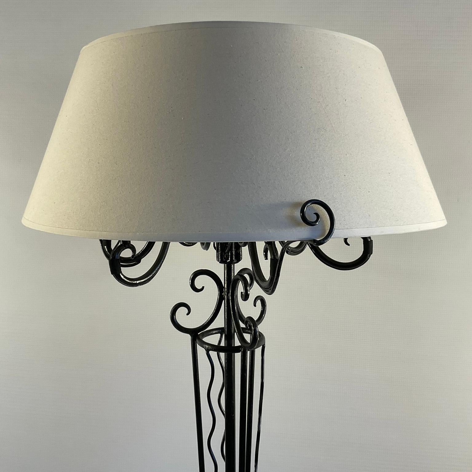 Art Deco wrought iron floor lamp from the 1920s in the style of René Prou, with its original lampshade redone in linen fabric.
Lampshade dimensions :
Top diameter/42cm
Bottom diameter/60cm
Height/24cm