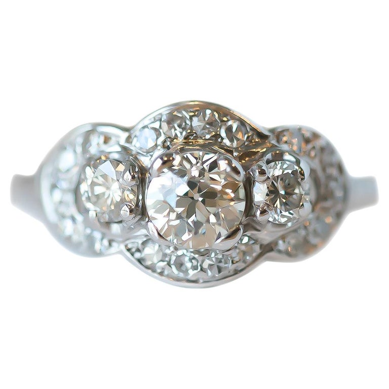 1920s Art Deco GIA 1.25 Carat Diamond Three-Stone White Gold Engagement Ring