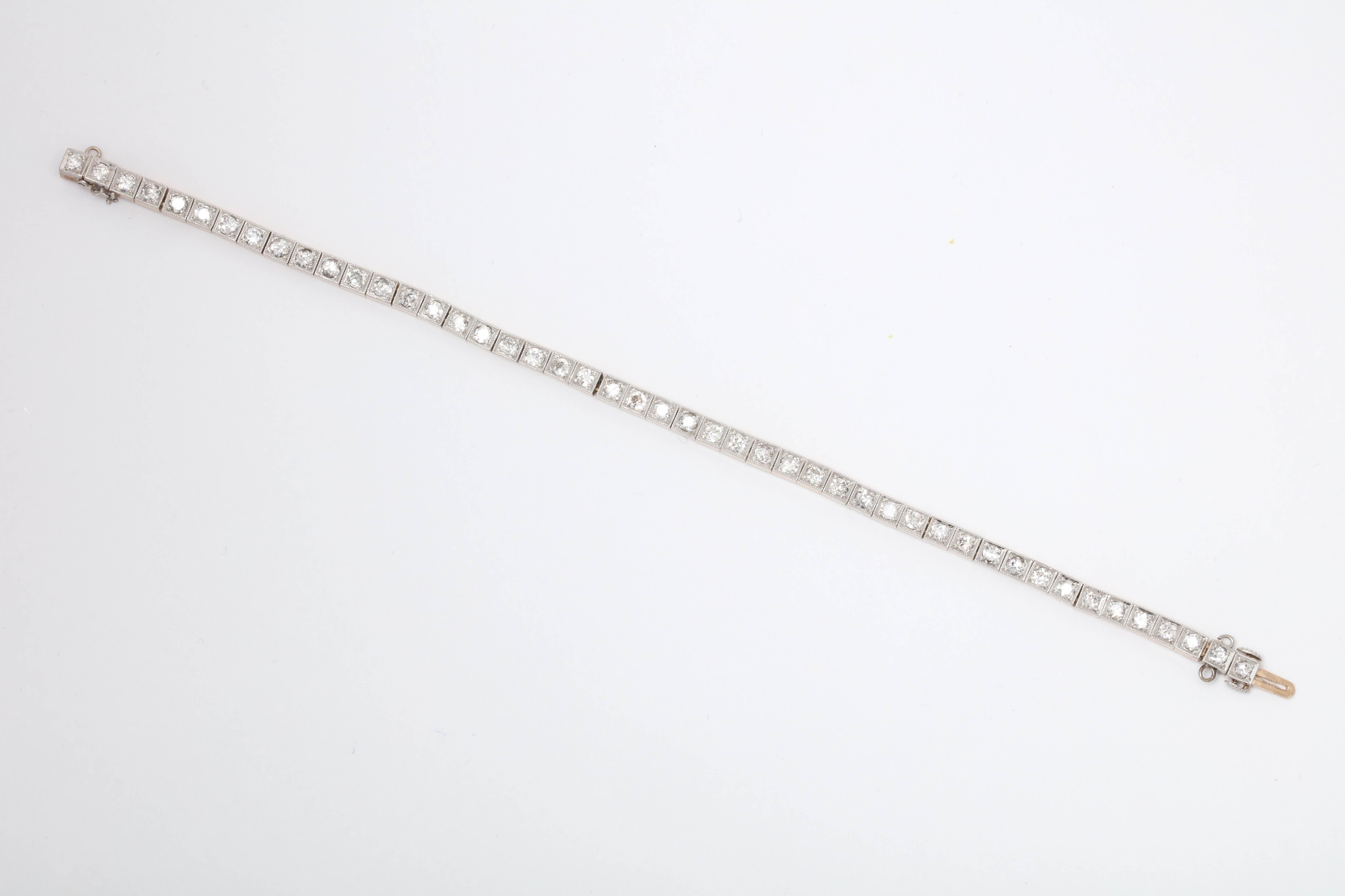 1920s Art Deco Highly Flexible Diamond Gold and Platinum Straightline Bracelet In Good Condition In New York, NY