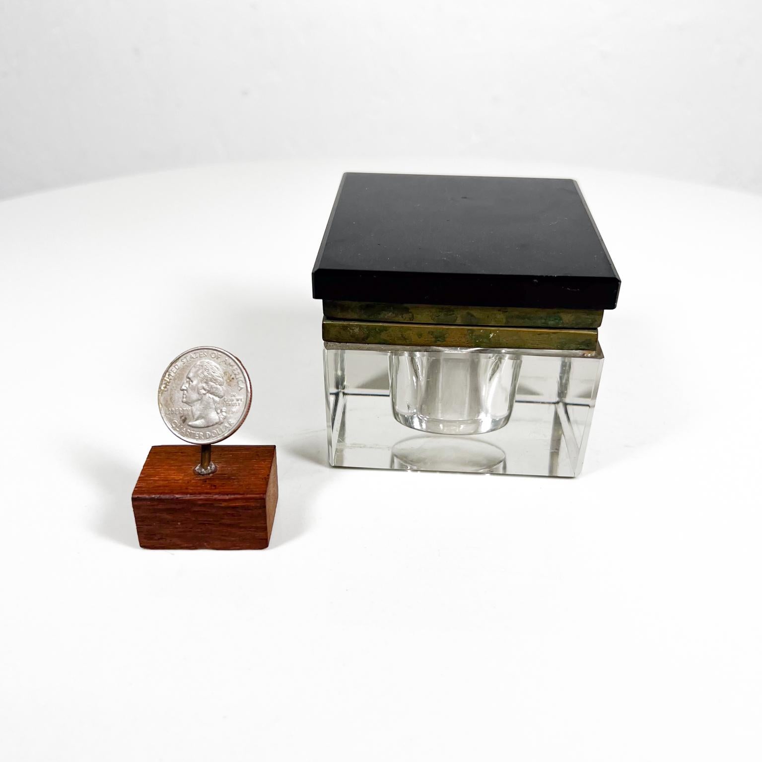 1920s Art Deco Clear Beveled Solid Glass Inkwell with Brass Hinged Black Onyx Glass Top
2.88 x 2.88 x 2.38 H.
Unrestored Preowned vintage condition.
See images provided.
