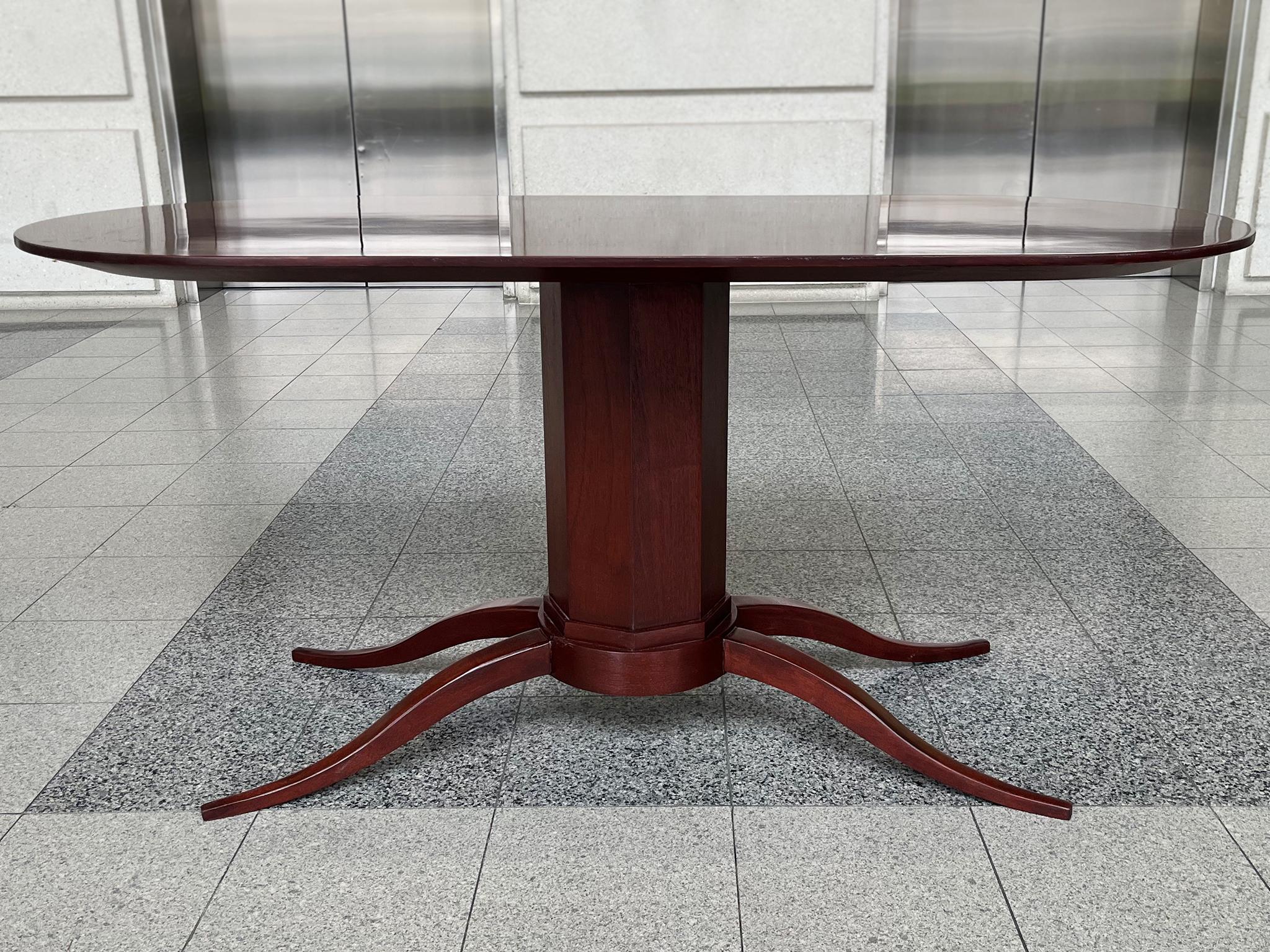 This Art Deco racetrack table was crafted in the 1920s. It is mahogany and newly refinished, with a rich, warm red-brown tone. The pedestal base culminates in 4 elegant sprawled feet.

Dimensions:
60 in. width
27 in. depth
28.5 in.