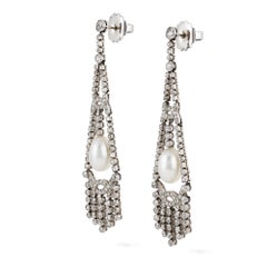 Importante par de pendientes Art Déco de perlas y diamantes