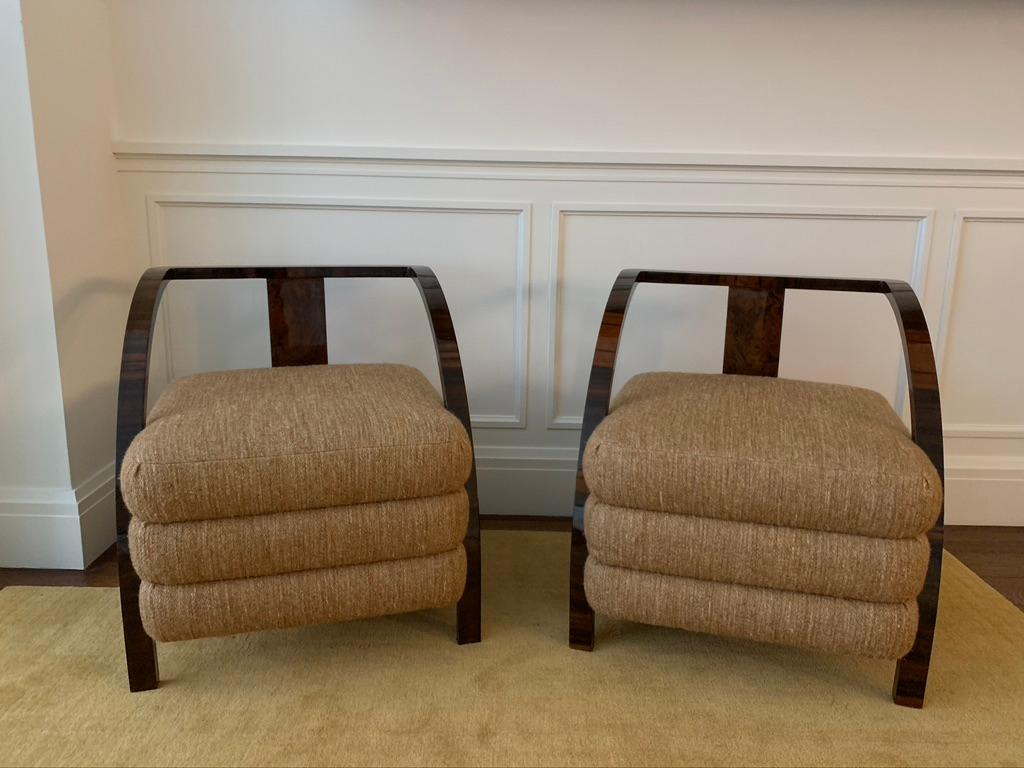Pair of recently restored 1920's art decor armchairs made of walnut and reupholstered in Loro Piana Bukhara Plain Camargue fabric.