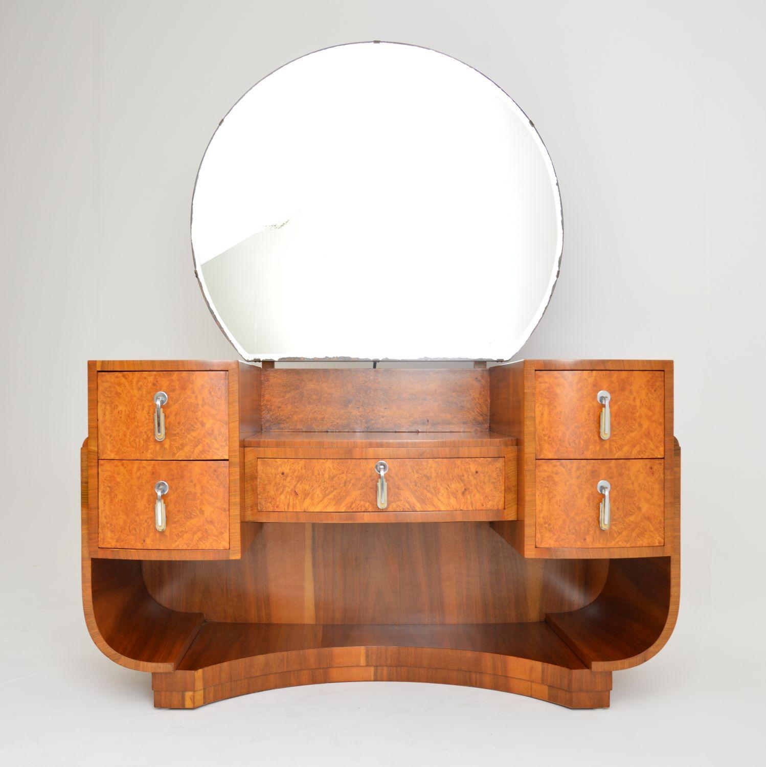 A beautiful and extremely well made original Art Deco period dressing table. This is made from burr walnut, it dates from the 1920s-1930s. The quality is excellent, and so is the condition. We have had this stripped and re-polished to a very high