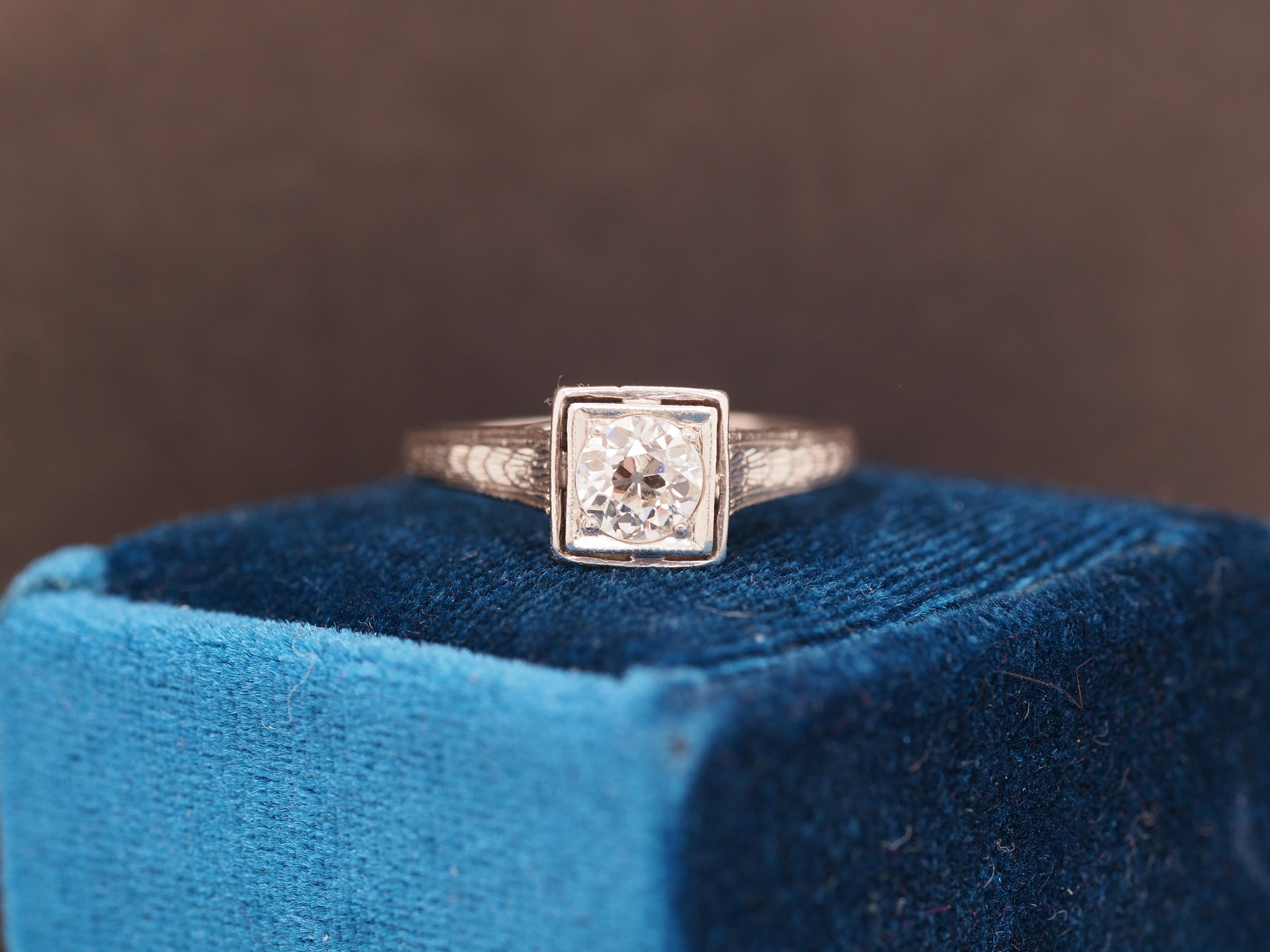 Year: 1920s
Item Details:
Ring Size: 6.25
Metal Type: Platinum [Hallmarked, and Tested]
Weight: 3.1 grams
Diamond Details
Center Diamond: .50ct, Old European Brilliant, G Color, SI2 Clarity
Band Width: 1.75mm
Condition: Excellent