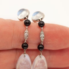 1920s Art Deco Platinum Carved Moonstone Diamond Onyx Drop Earrings