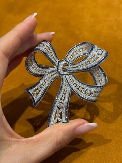 1920's Art Deco Platinum Diamond and Sapphire Bow Brooch