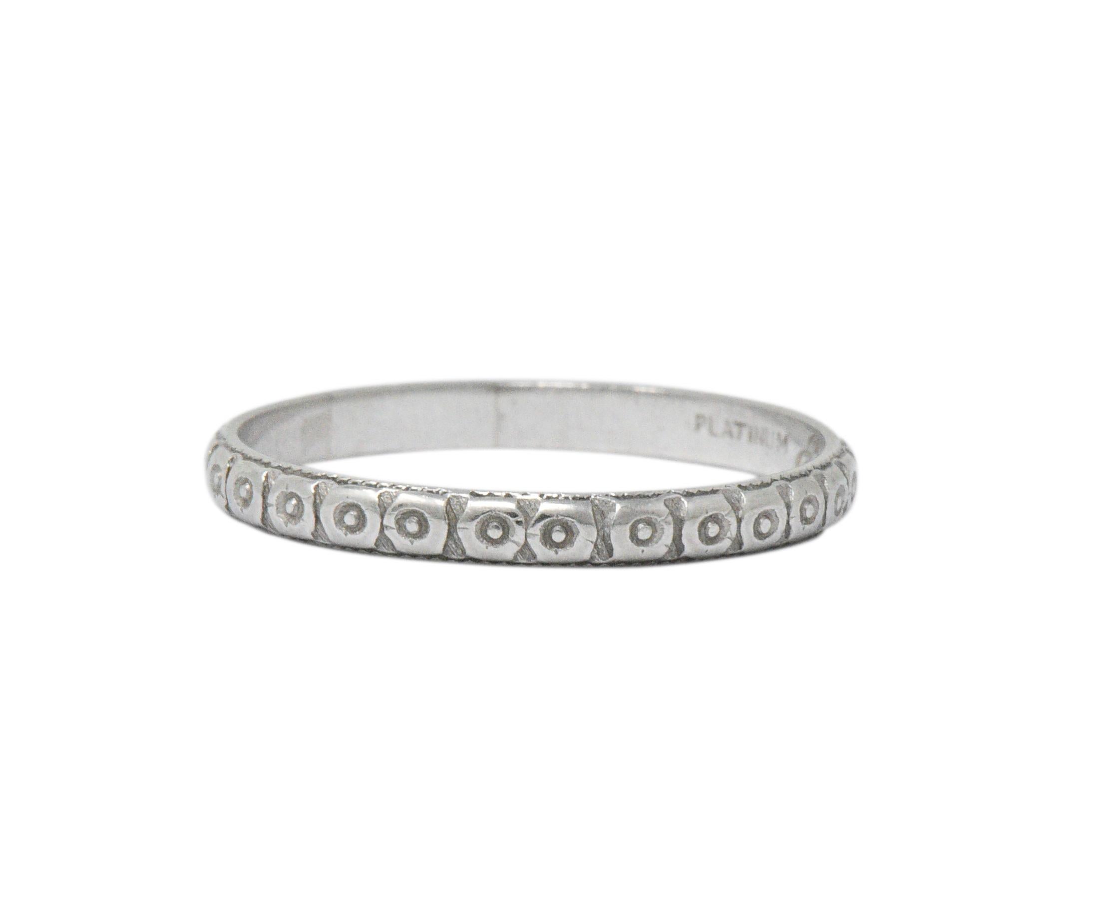 Designed as band of flower blossoms, worn

Engraved on the inside with 