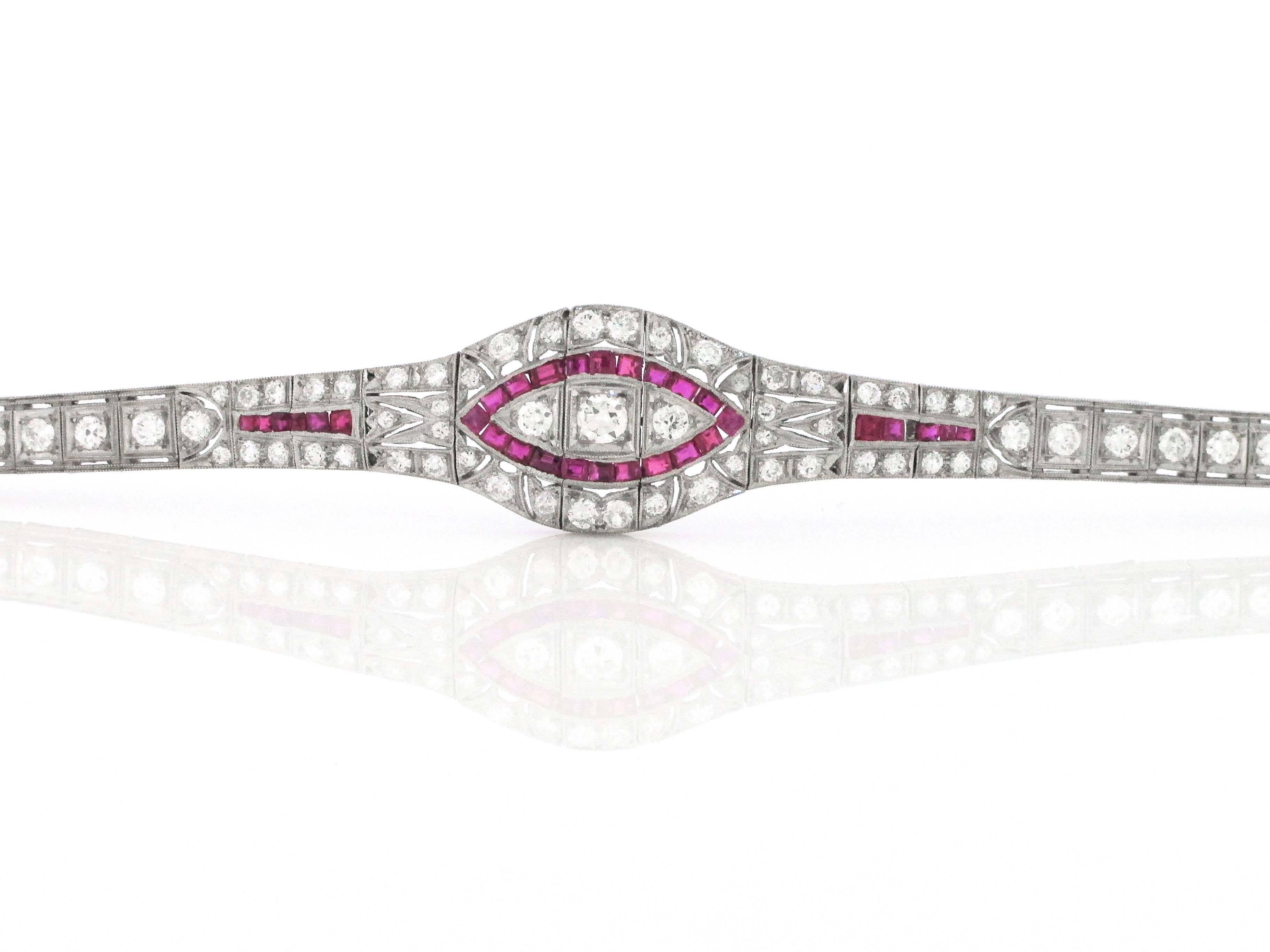 A spectacular representation of authentic 1920's Art Deco jewelry. This Ruby and Diamond bracelet looks like it came straight from the Gatsby collection. It is super elegant and in superb condition. The bracelet fits nicely on the wrist and the