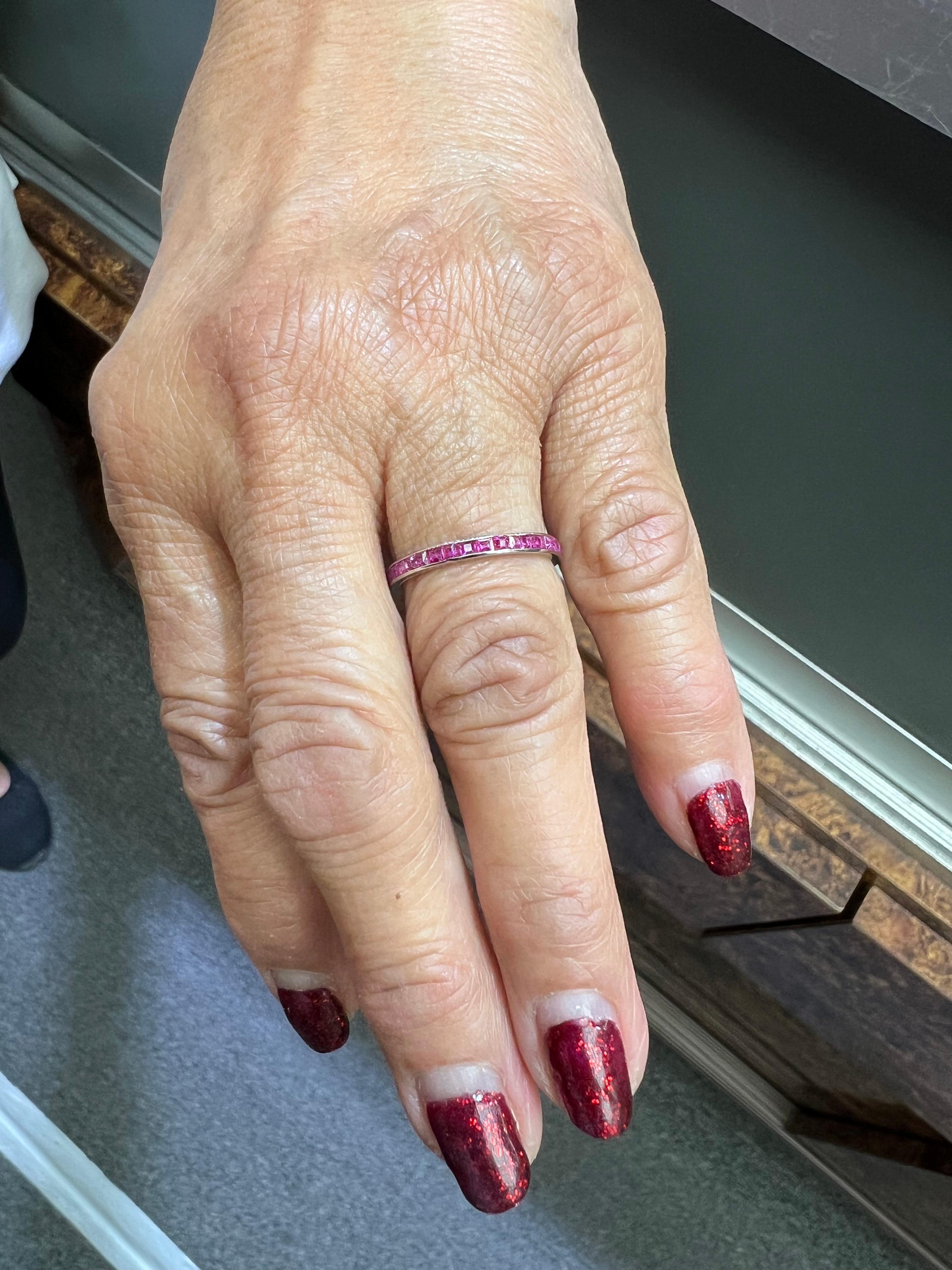 1920s Art Deco Ruby Platinum Eternity Band Size 6.

The Art Deco Ruby and Platinum Eternity Band from the 1920s is a size 6.  The calibrated cut Rubies are channel set.  This is a great ring to stack with other bands an engagement ring or simply by