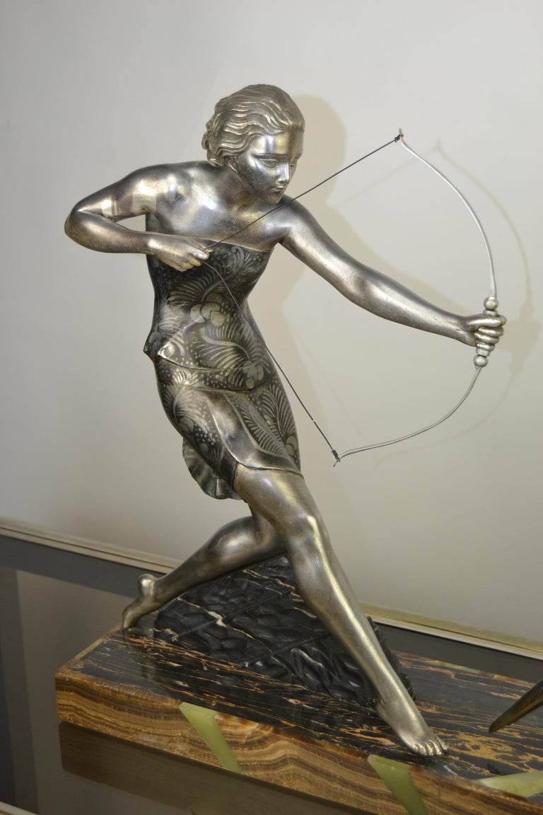 1920s Art Deco Sculpture by Uriano, Woman Shooting Two Birds at 1stDibs