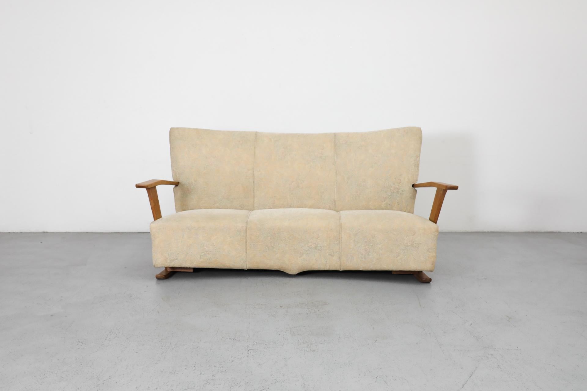 Beautiful C. De Jong Art Deco 3 seater sofa with original light patterned velvety fabric and oak frame with gently angled armrests for J.A. Boskamp En Zonen. Boskamp & zonen was a furniture maker based in Overveen that was active from the 1910's to