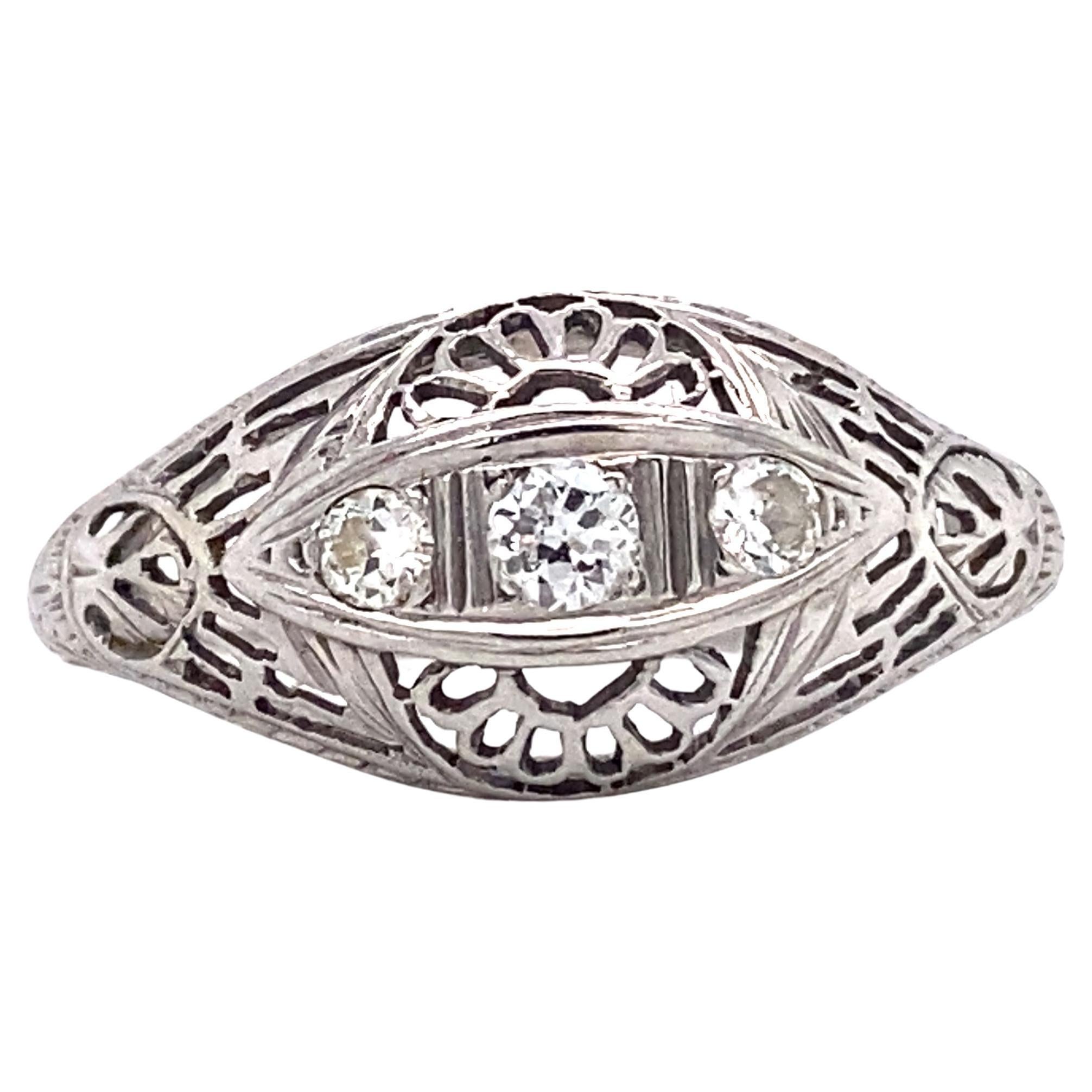 1920s Art Deco Three Stone Diamond Filigree Ring in 18 Karat White Gold