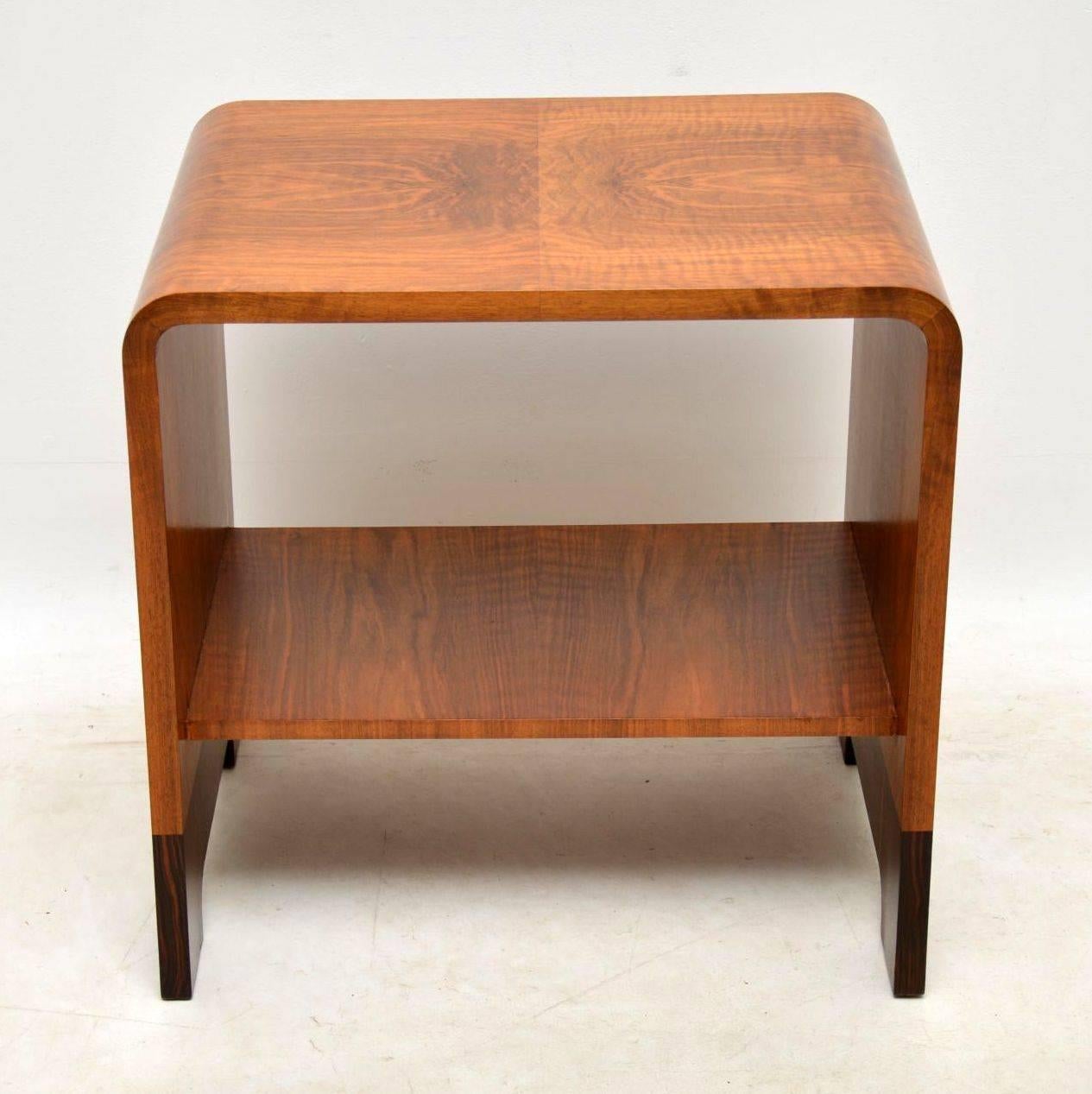 A beautiful and unusual original Art Deco coffee table in walnut, with a wood base. This dates from the 1920-30’s, it is of exceptional quality. We have had this fully stripped and re-polished, the condition is superb throughout.

Width – 62