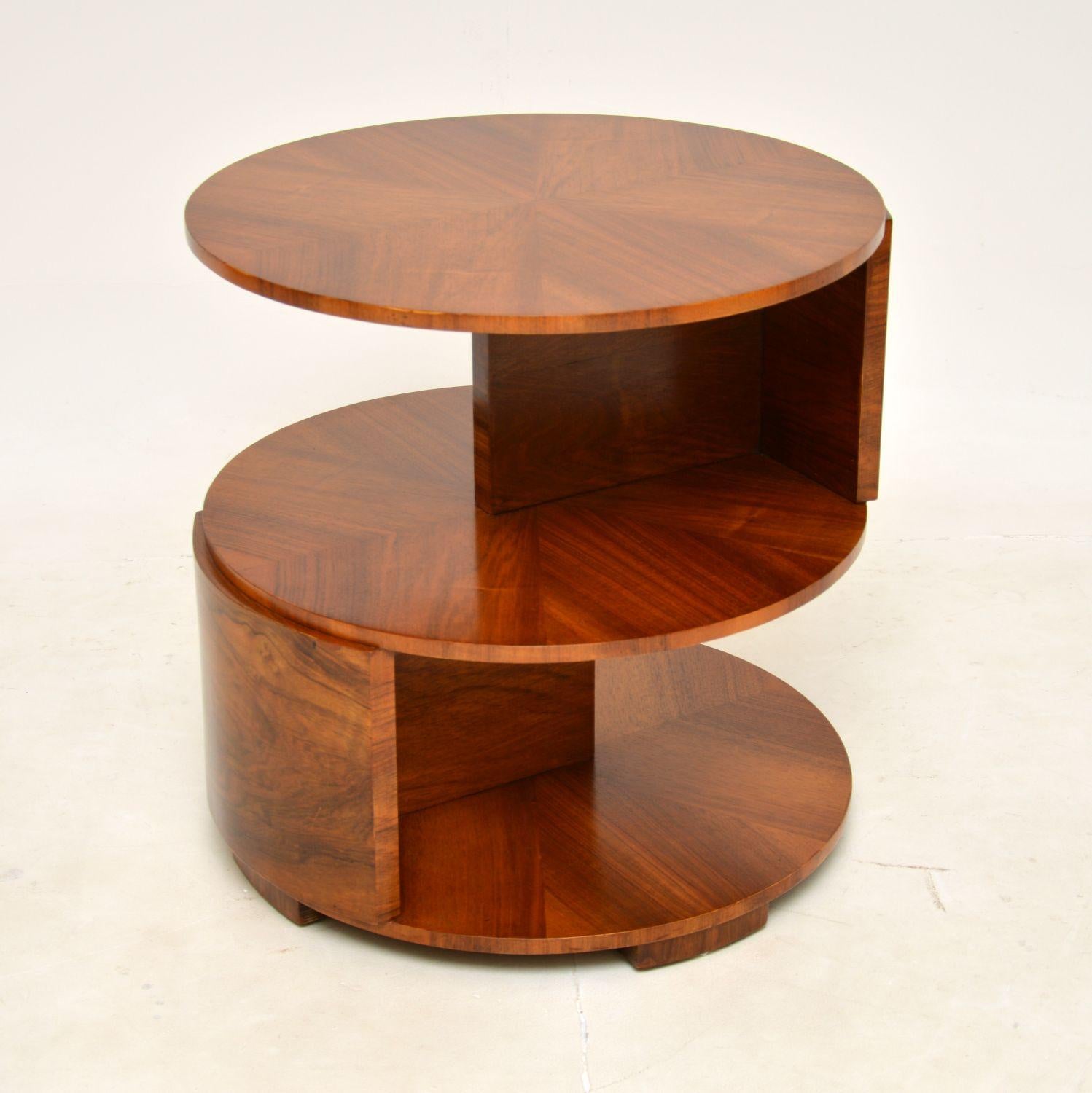 A fantastic original Art Deco period occasional side / centre table in walnut. This was made in England, it dates from the 1920’s.

It has a beautiful stepped design, with the three circular tiers overhanging each other giving an S shaped profile.