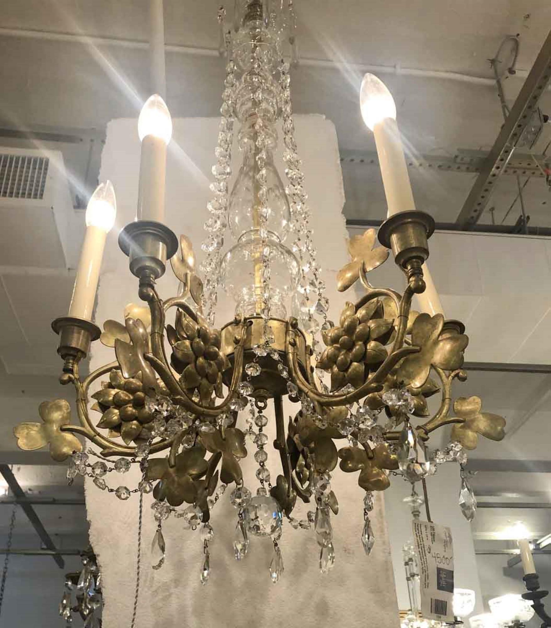 1920s Art Nouveau six arm crystal chandelier featuring gilt and bronze. Cleaned and rewired. Please note, this item is located in one of our NYC locations.