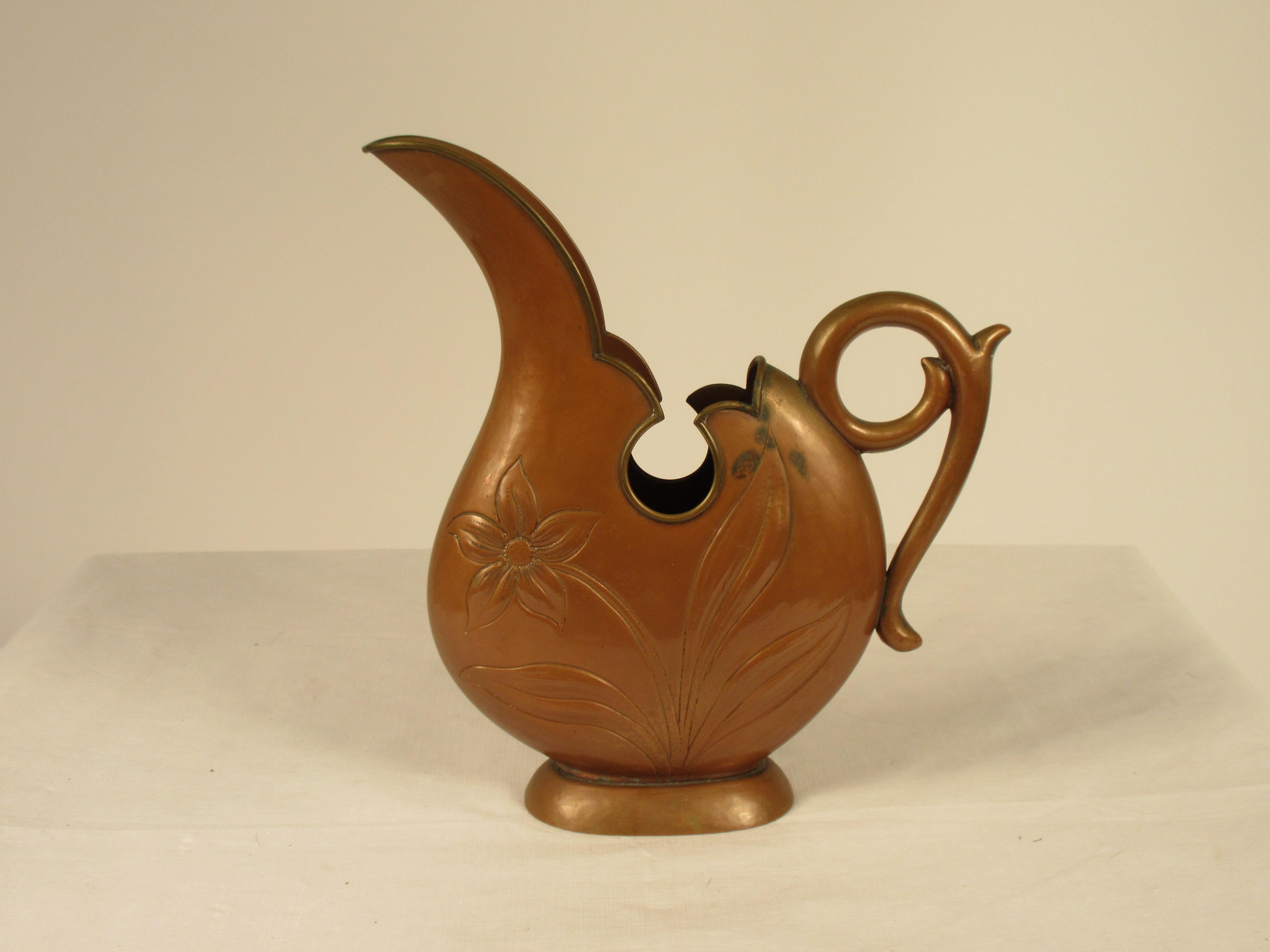 1920s Art Nouveau copper pitcher.