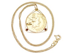 1920s Art Nouveau Garnet and Yellow Gold Coin Pendant