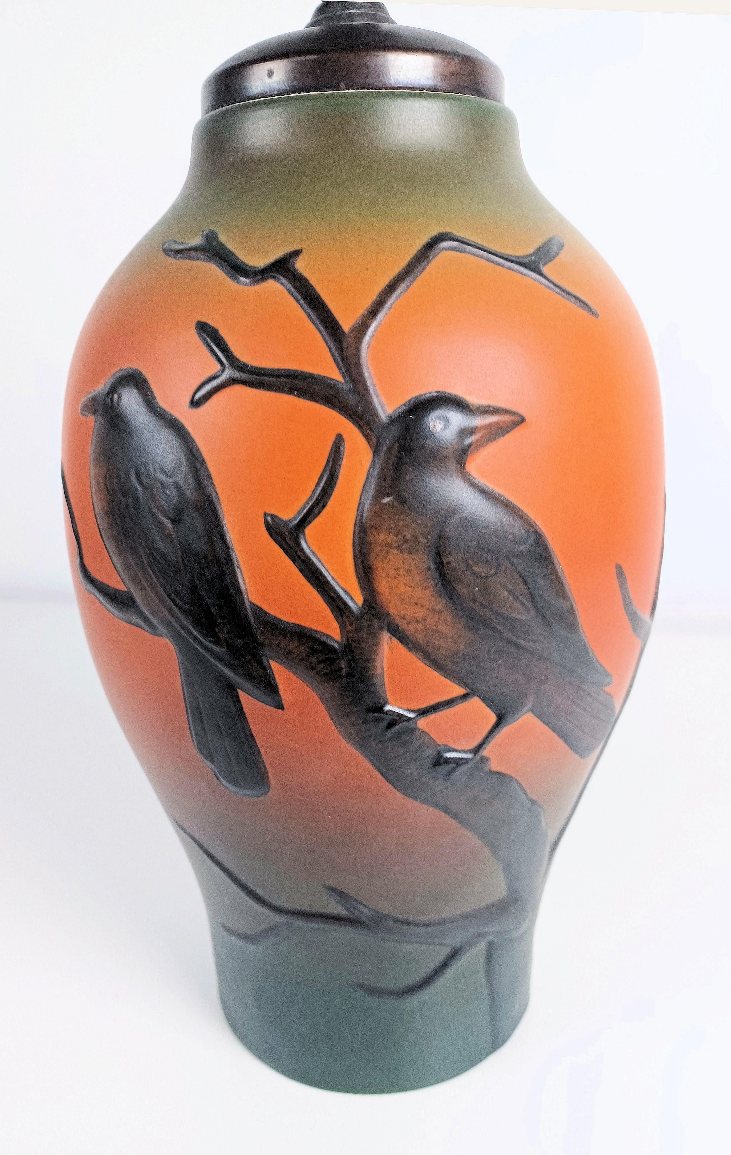 1920sArt Nouveau hand-crafted table lamp by Georg Thylstrup for P. Ipsens Enke

The hand-crafted art nouveau table lamp was designed by eorg Thylstrup in 1927 and feature  two craws sitting on a branch. 

The table lamp is in very good  vintage