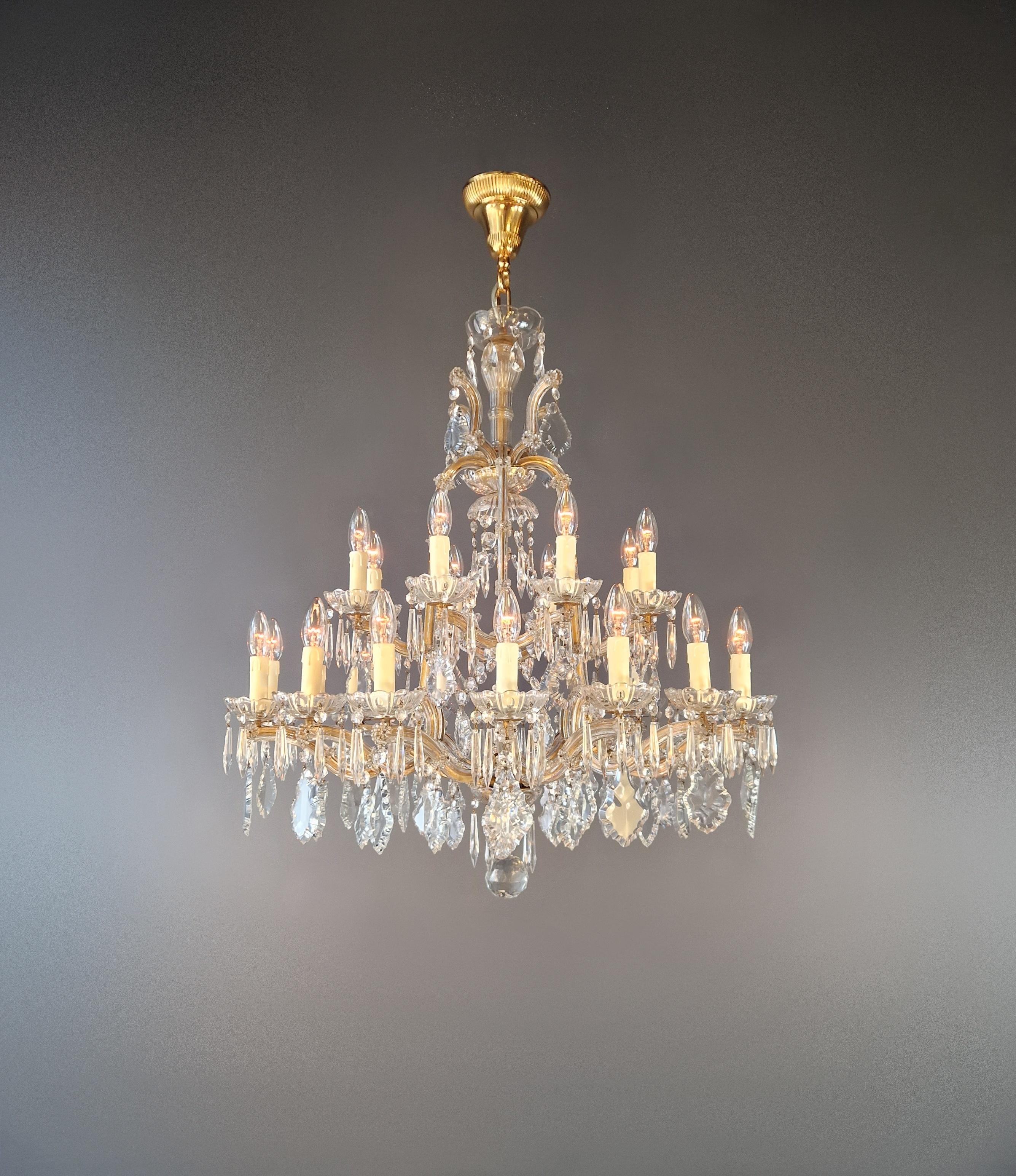 For sale is a stunning antique chandelier that has been professionally restored in Berlin. The chandelier has been meticulously re-wired and is now ready to be hung. Not a single crystal is missing, and the cabling and sockets have been completely