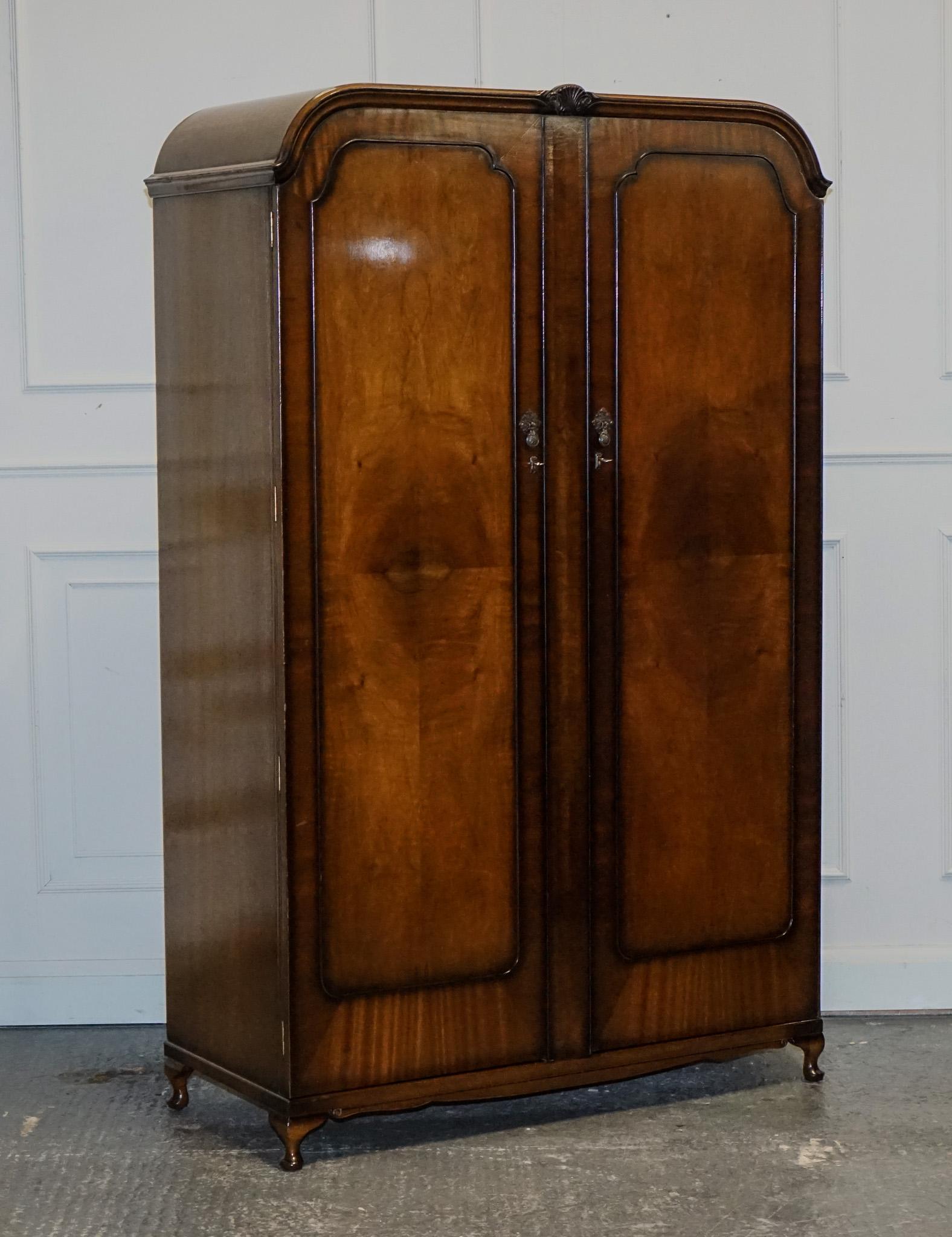 
We are delighted to offer for sale this 1920s Art Deco Double Burr Walnut Wardrobe.

A solid and well made wardrobe with lots of space inside, the top of the wardrobe inside has a compartment to put anything you like, and below you will find a