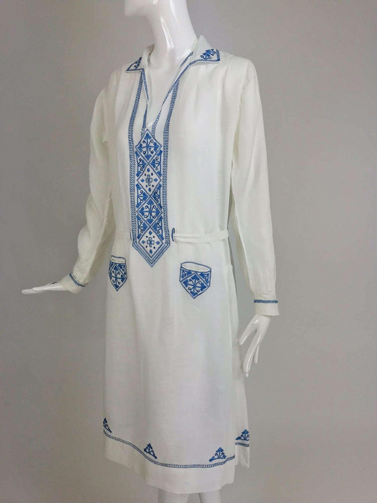 1920s arts and crafts embroidered blue and white linen day dress. This is such an amazing example of the ethnic trend of early 20th century women's fashion worn by artists and the avant garde, this style was beautifully hand embellished, loose and
