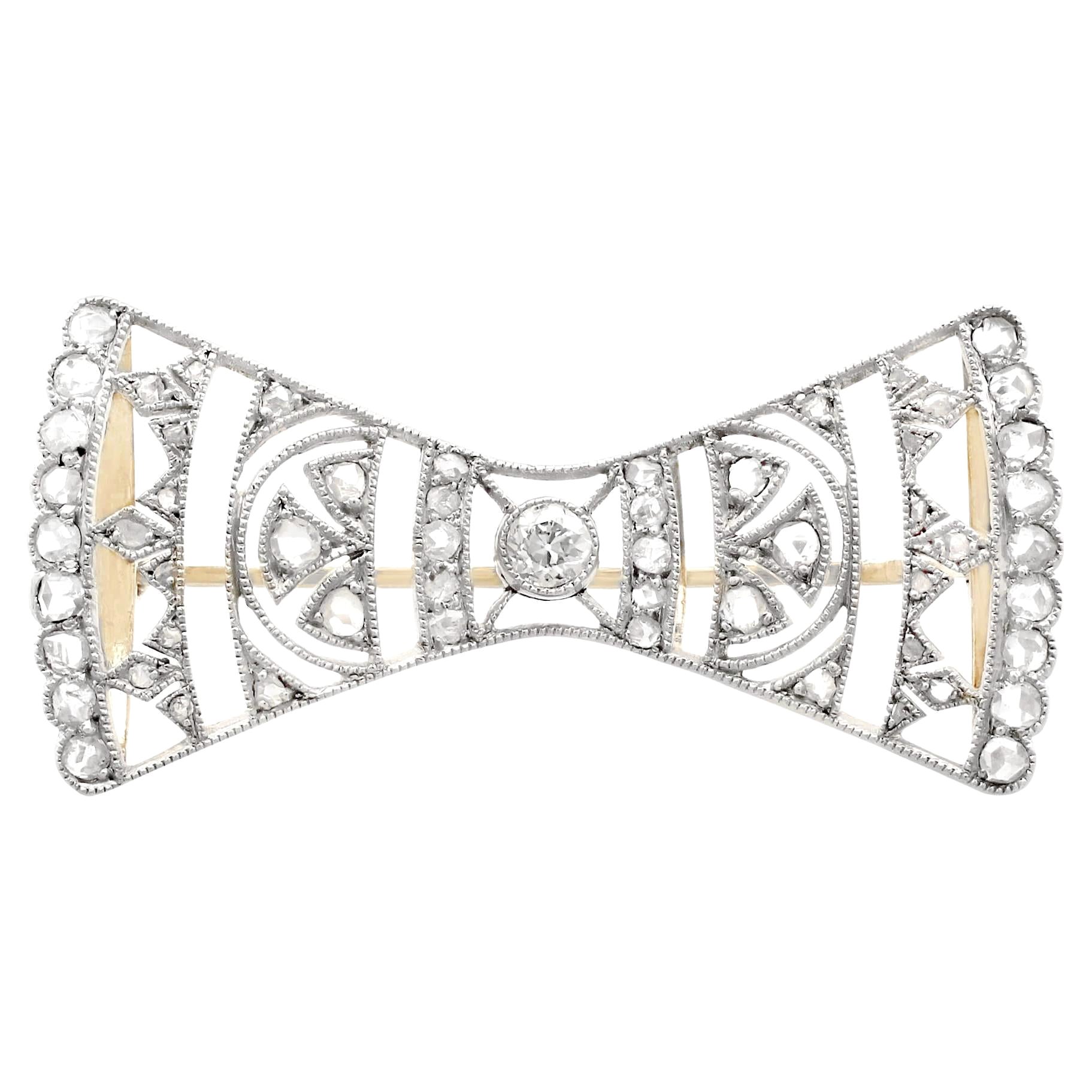 Broche de lazo austrohúngaro de oro amarillo y diamantes de los años 20