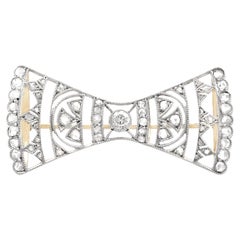 1920s Austro-Hungarian Diamond and Yellow Gold Bow Brooch