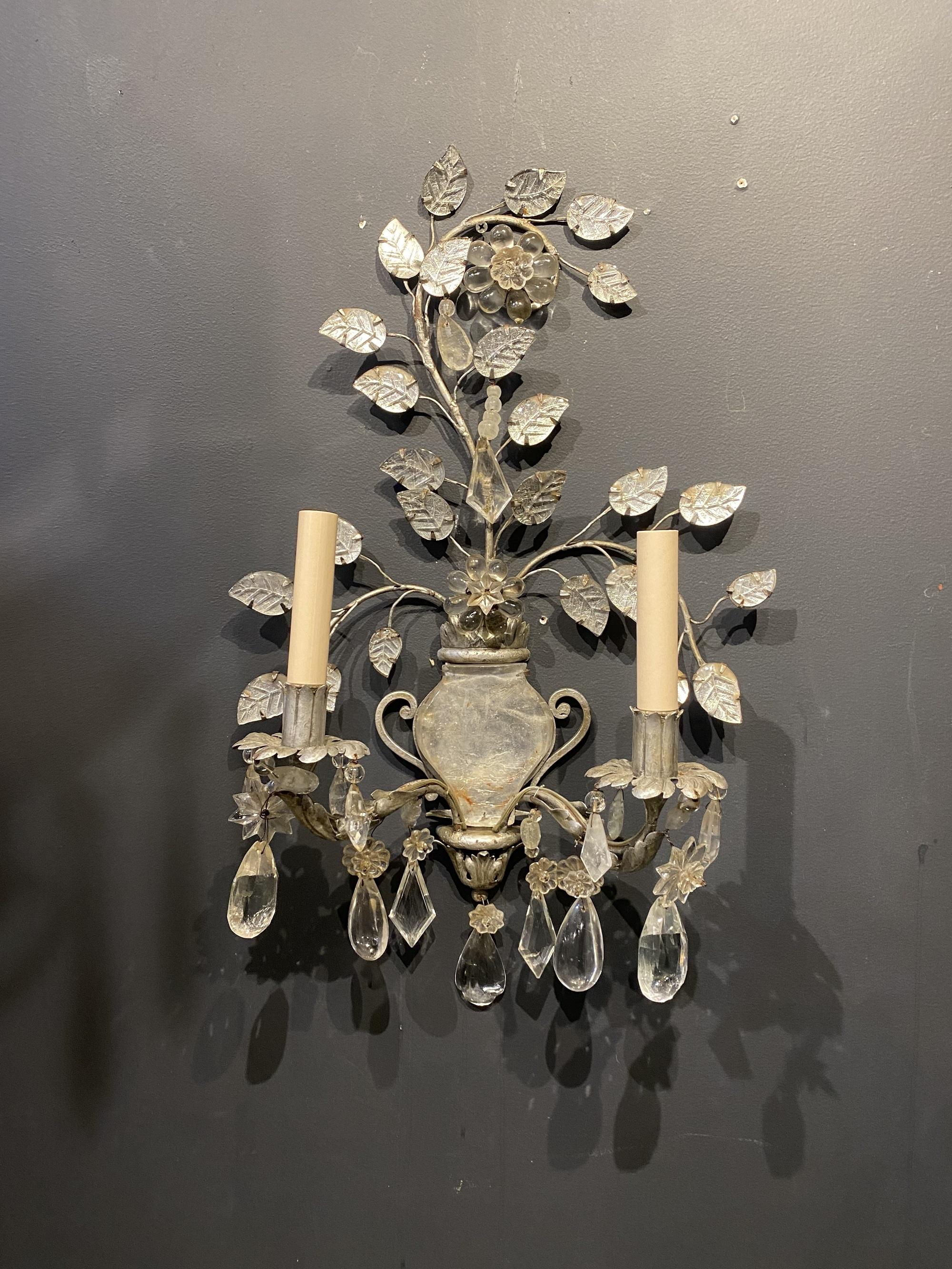 A pair of 1920’s French silvered metal Bagues sconces with rock crystal hangings and body 