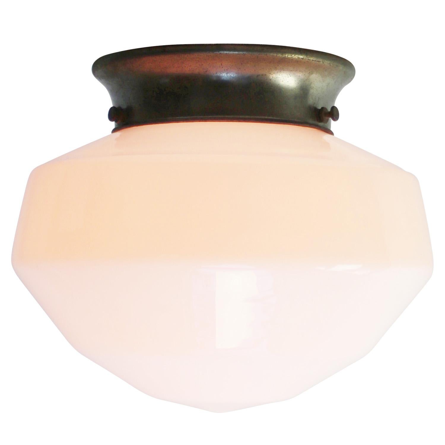 Vissolite, Belgium
1920s White opaline Ar Deco Flush Mount
Metal glass holder with white porcelain bulb holder

Diameter glass holder 16 cm / 6.3 inches

Weight: 1.00 kg / 2.2 lb

Priced per individual item. All lamps have been made suitable by