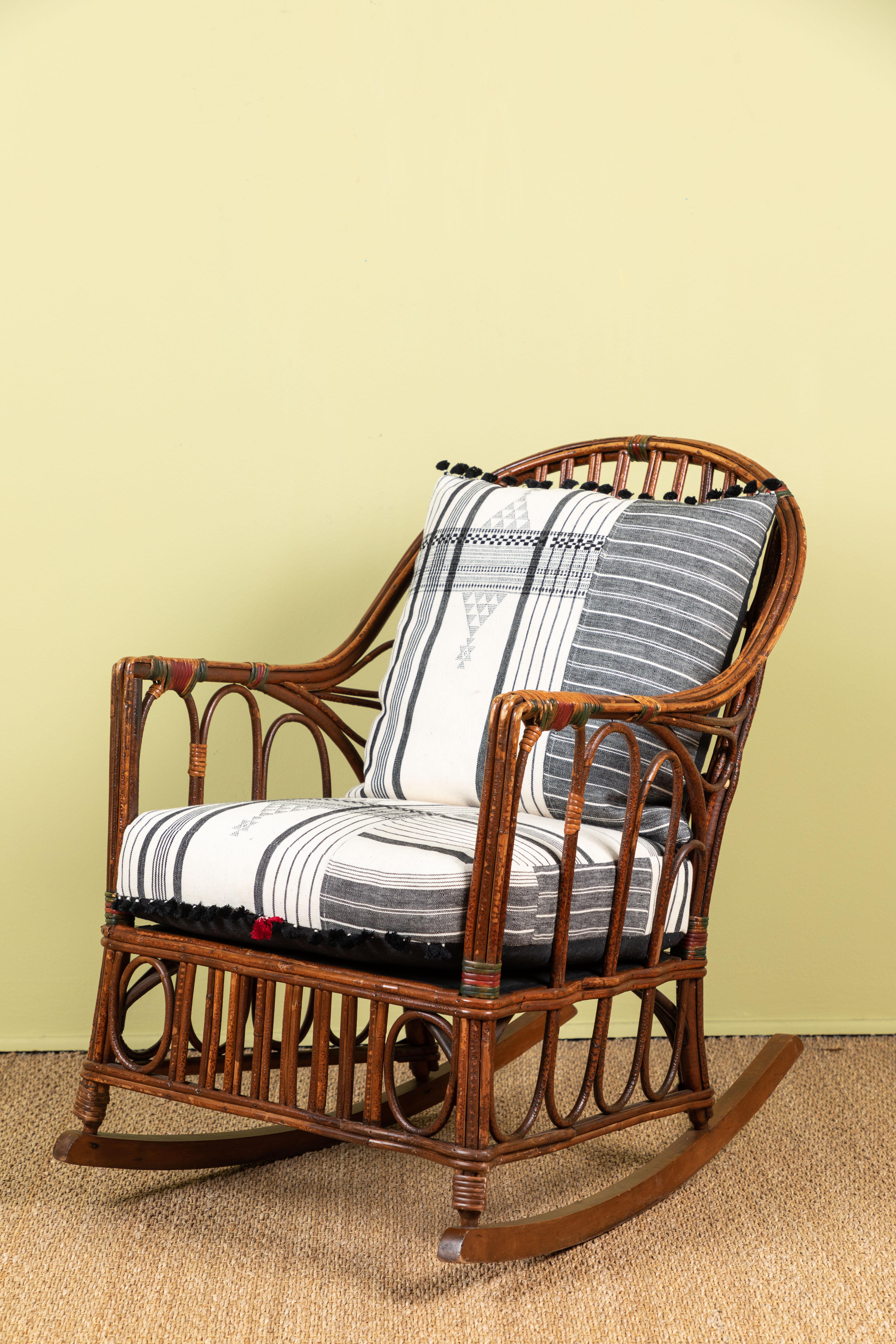 Classic East Coast Americana rocking chair with cushions made of Injiri organic cotton textiles from India. Textile has areas of hand embroidery and hand tied tassels at edges. Part of a set with upright chair and love seat but can be purchased