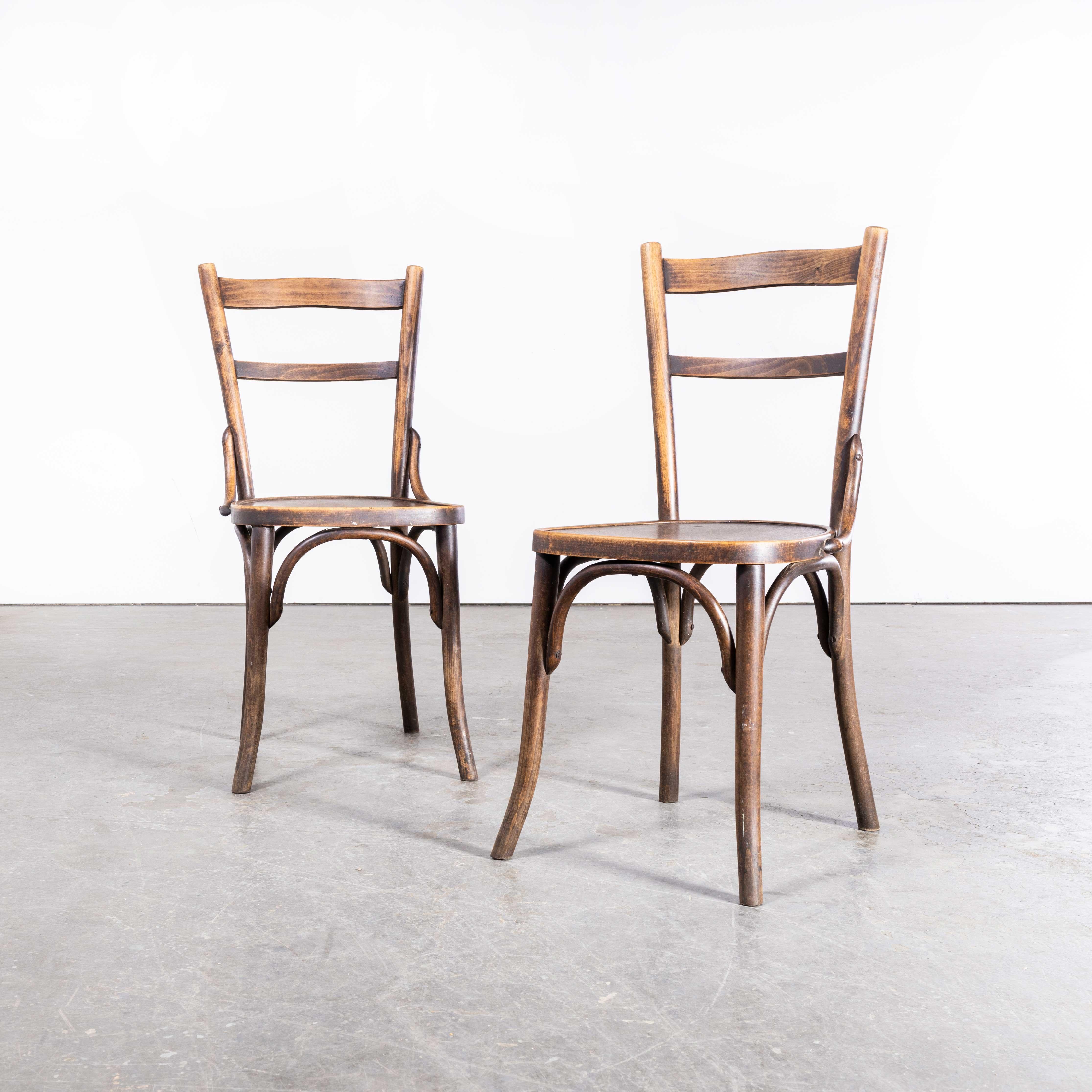 1920s Bentwood Debrecen Ladder Back Dining Chairs – Pair
1920s Bentwood Debrecen Ladder Back Dining Chairs – Pair. It is hard to be precise about the origin of these chairs as little history is known, but what we do know is at the beginning of the