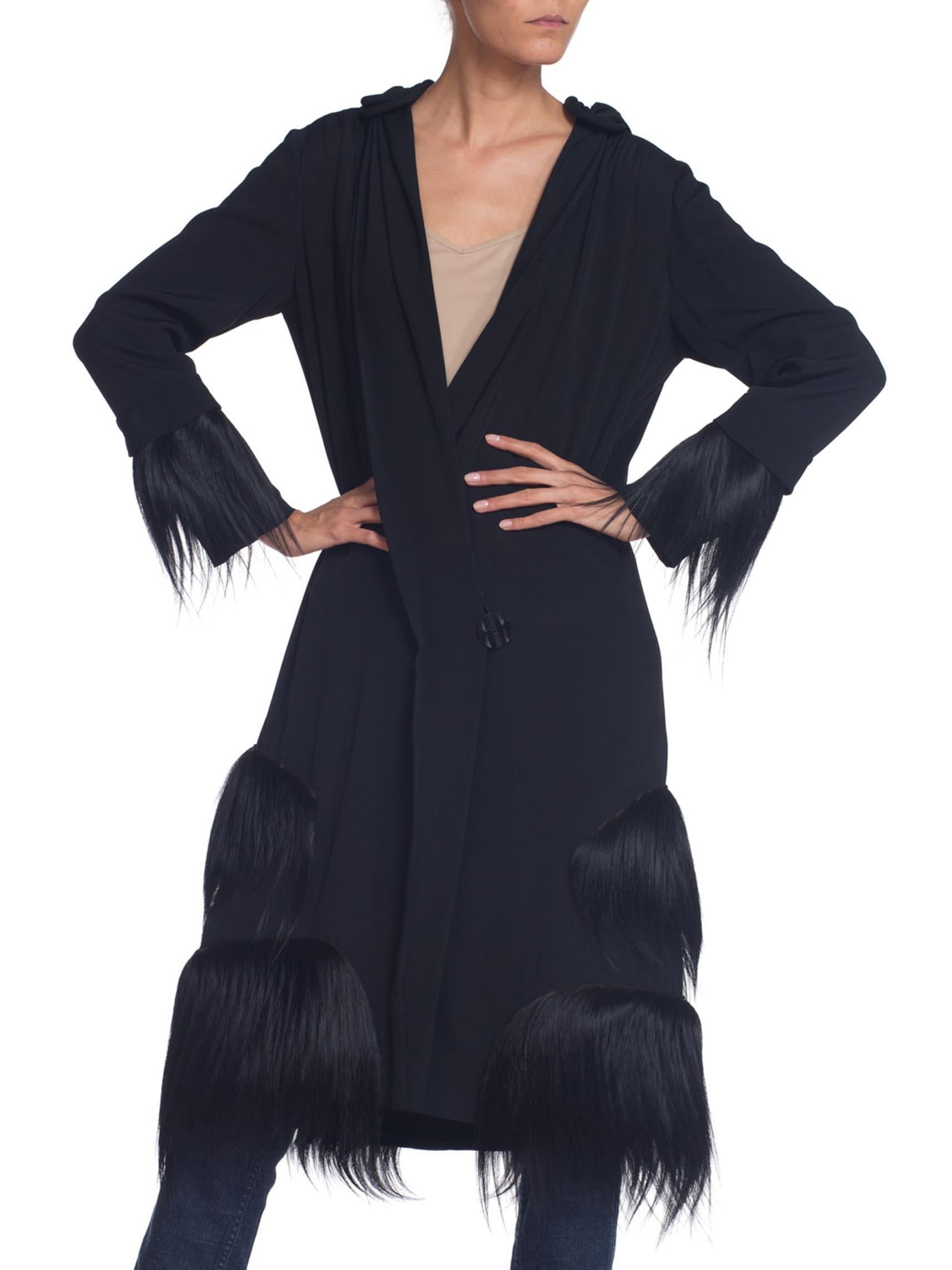 The fabric of this lightweight coat is in fantastic wearable condition and there is no damage to the full silk lining either. 1920S Black Silk Crepe De Chine Drop Waist Wrap Coat With Fur Trim