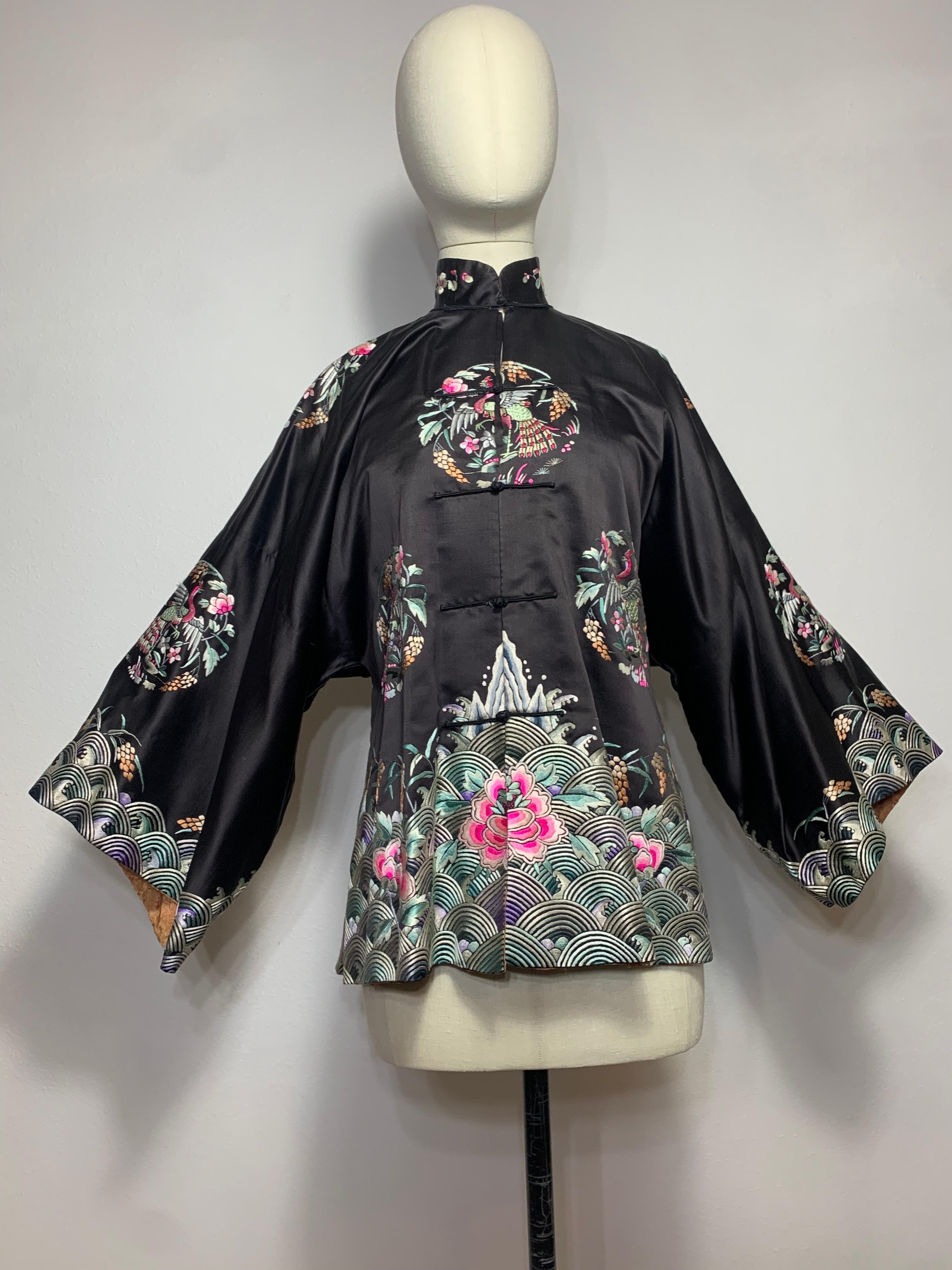 1920s Black Silk Satin Chinese Traditional Jacket w Colorful Hand Embroidery:  Nehru collar and satin frogs down front to close this beautifully hand embroidered bird motifs in pink, lavender and pale green decorate this traditional robe style