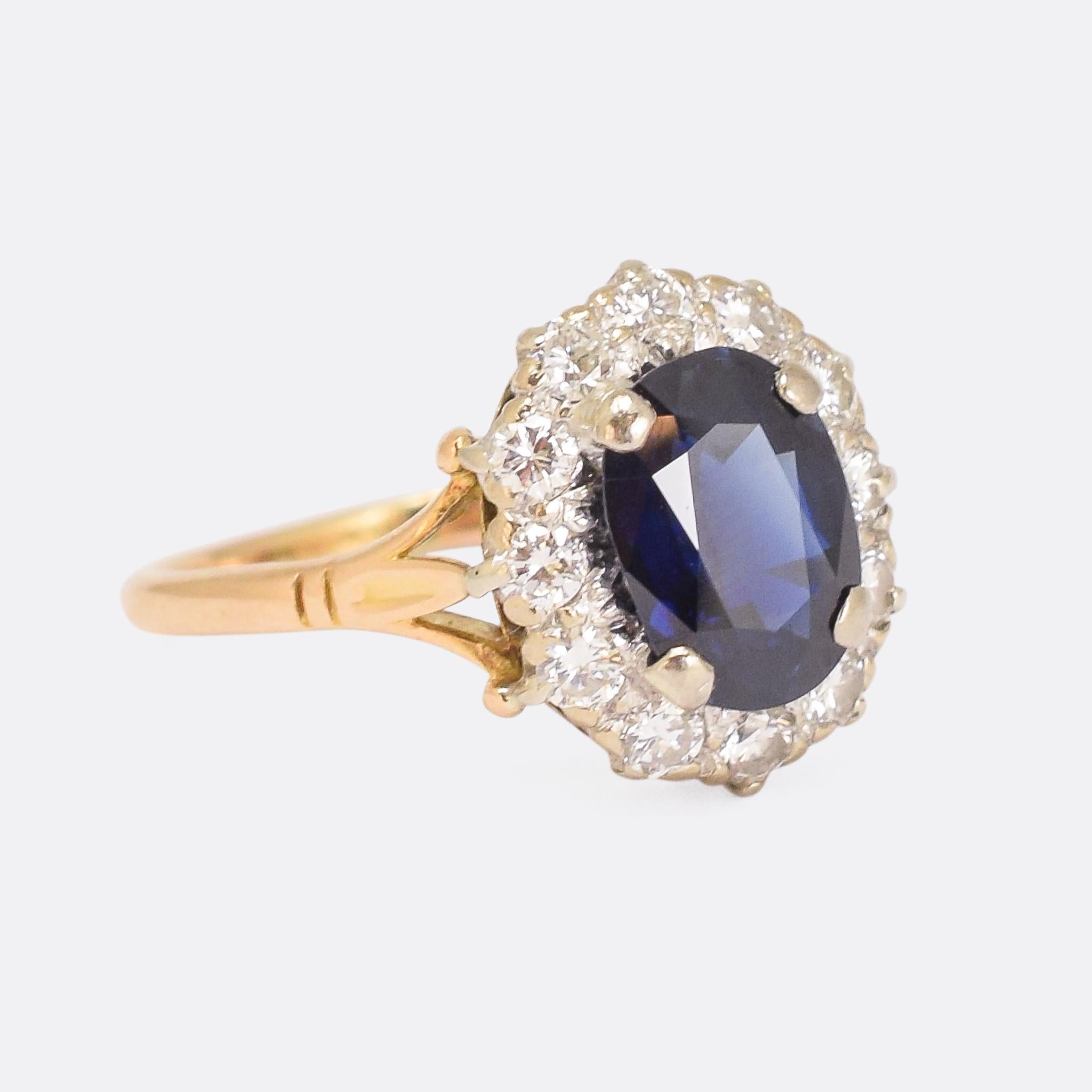An exceptional antique sapphire and diamond engagement ring dating from the 1920s. The principal stone is a natural no-heat cushion shaped sapphire, certified at 2.7 carats, and it's surrounded by a halo of bright brilliant cut diamonds. The band is