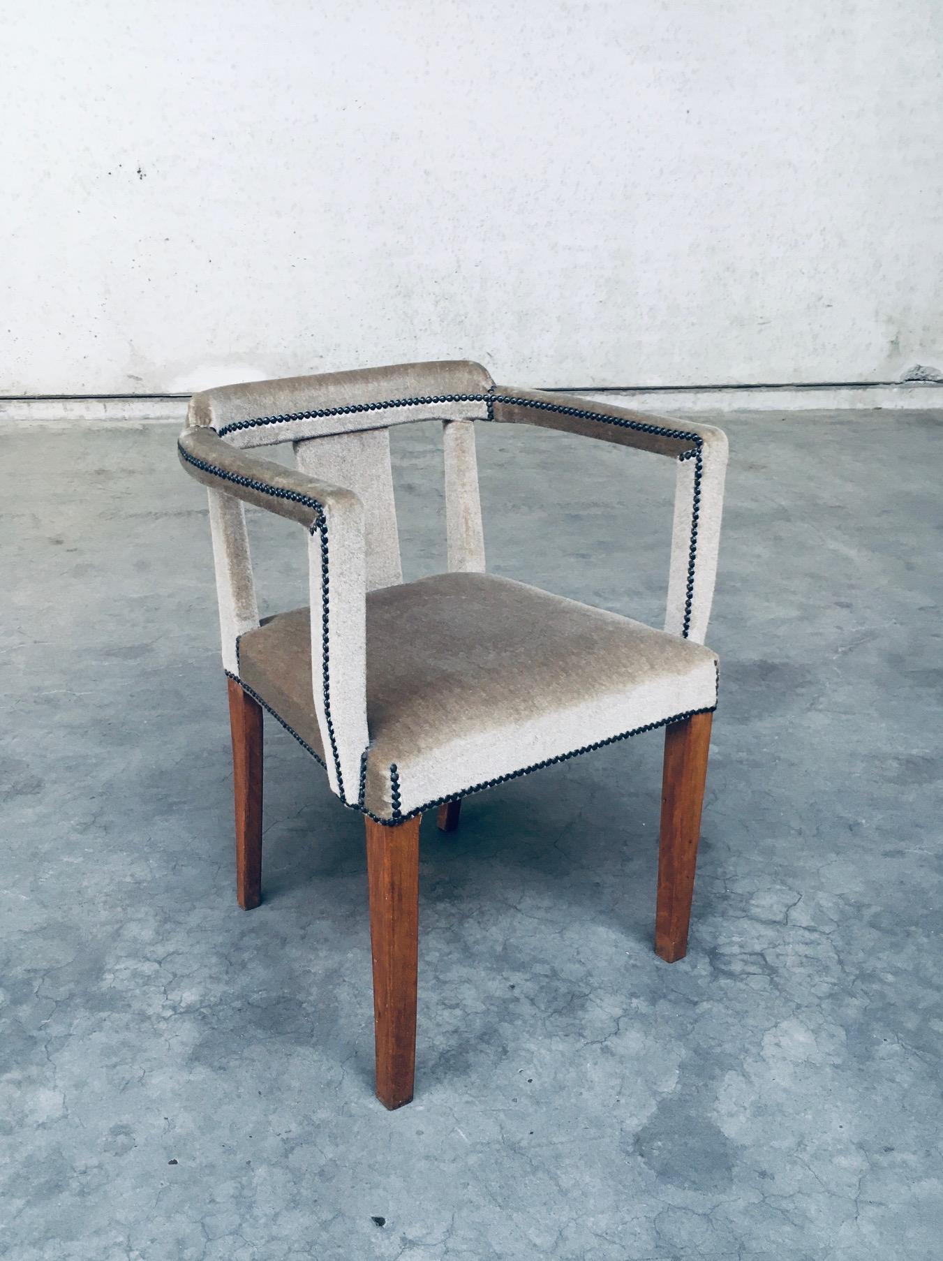 Early 20th Century Boudoir Velvet covered Side Arm Chair. Made in Scandinavia, Sweden, 1920's - 30's period. Teak wood construction with velvet covered seat, armrests and back finished with brass studs. The finish gives this a lush look and feel
