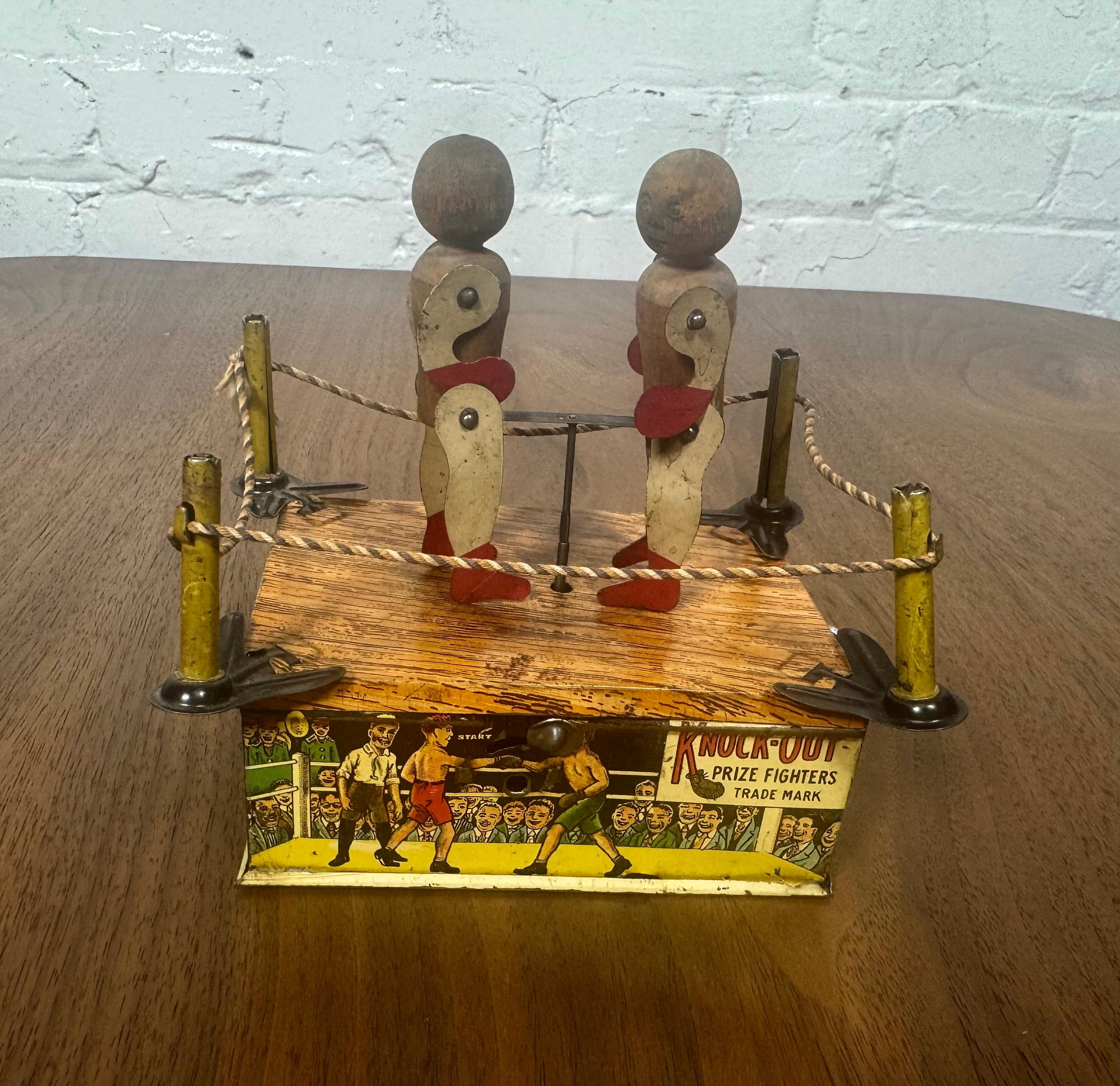 1920 Boxe en fer-blanc Wind-up 