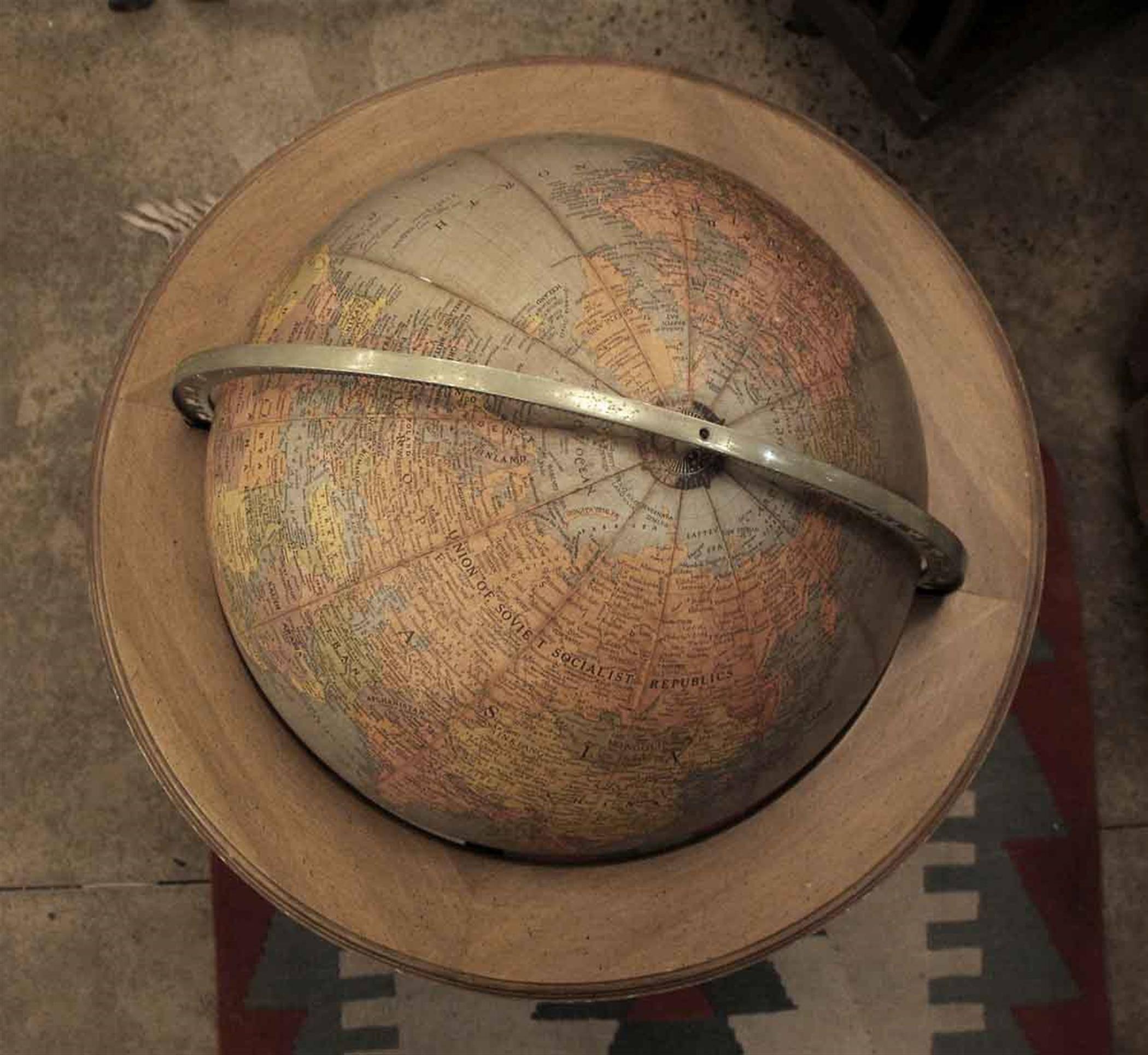 American 1920s Brandt Standing Floor Library Globe on a Wrought and Cast Iron Base