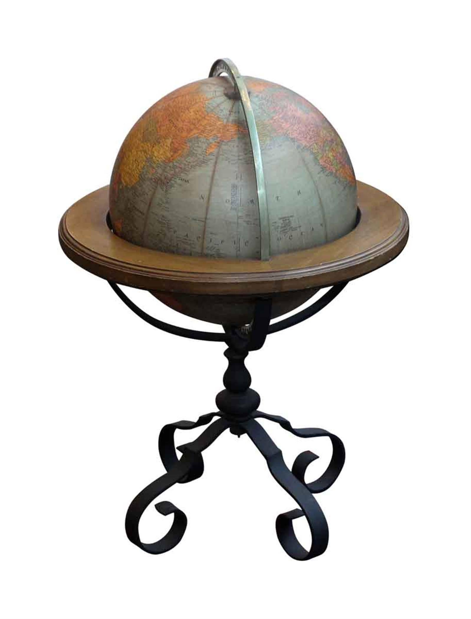 1920s Brandt Standing Floor Library Globe on a Wrought and Cast Iron Base In Excellent Condition In New York, NY