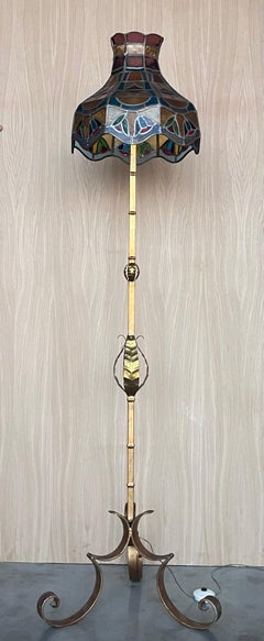 1920’s Brass And Iron Floor Lamp With Vintage Tiffany Style Swirl Shade