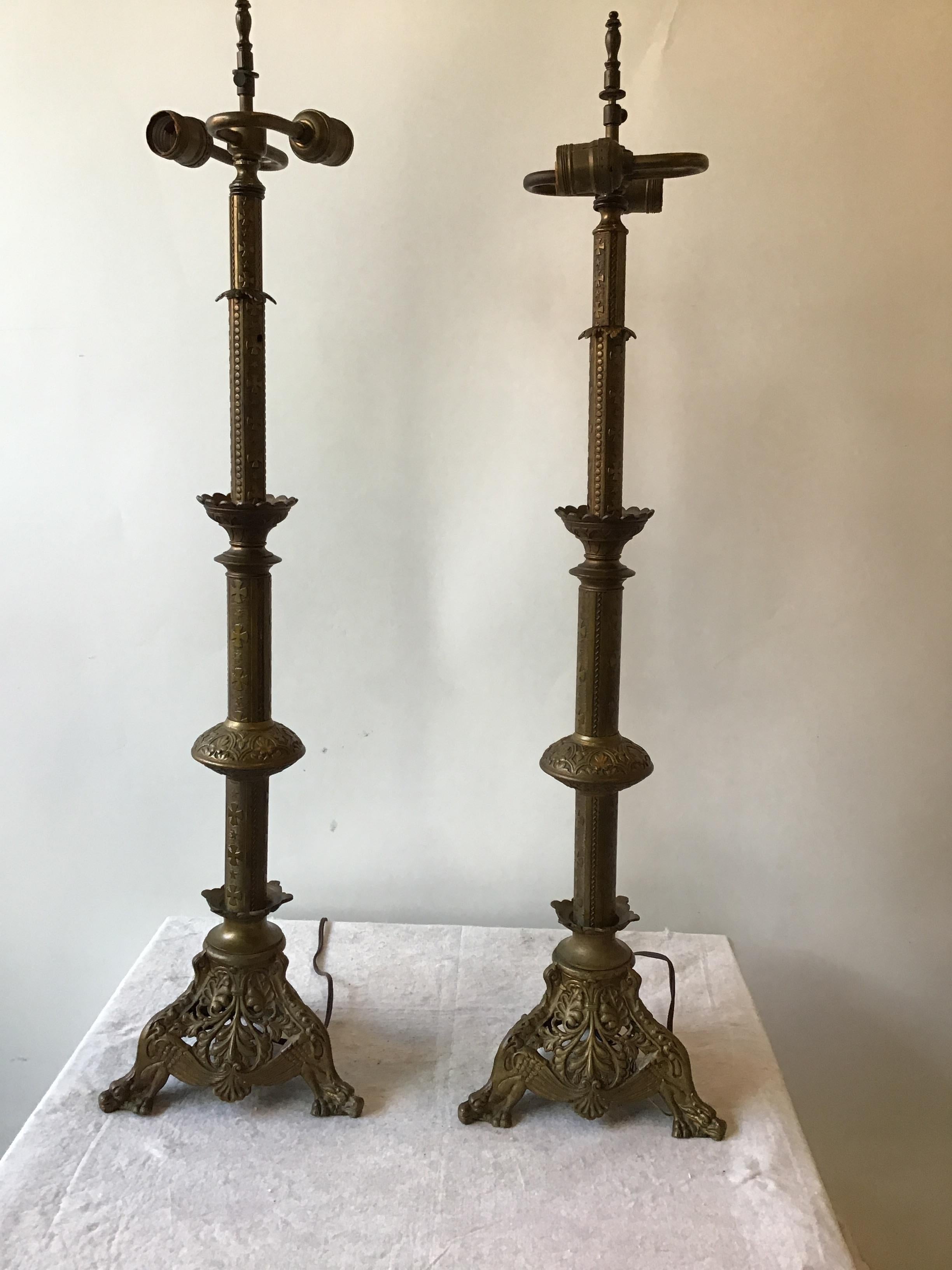 1920s brass church candlestick lamps.