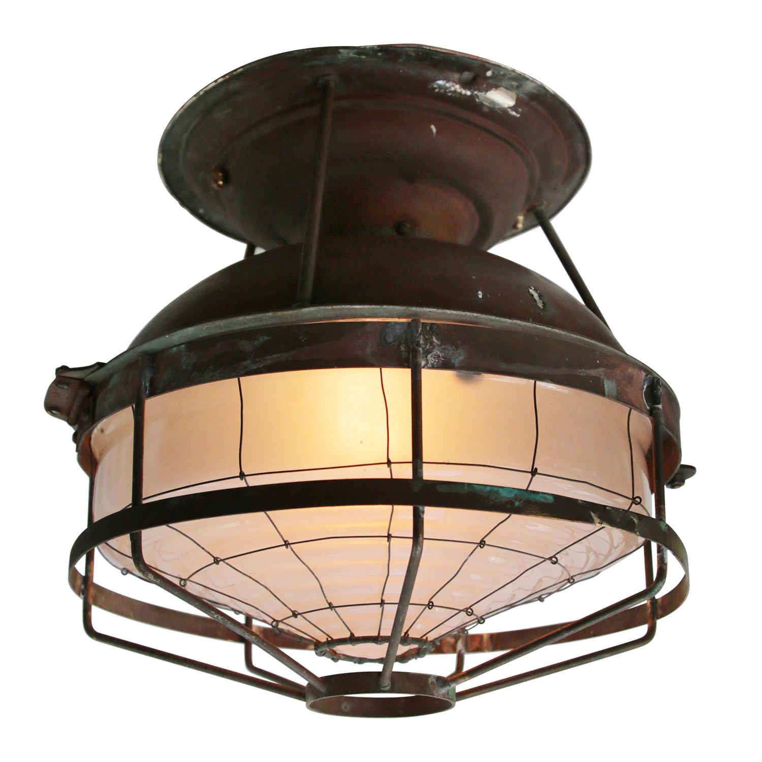 1920s French copper ceiling lamp / flush mount
Copper top with frosted glass.

Weight: 2.40 kg / 5.3 lb

Priced per individual item. All lamps have been made suitable by international standards for incandescent light bulbs, energy-efficient and