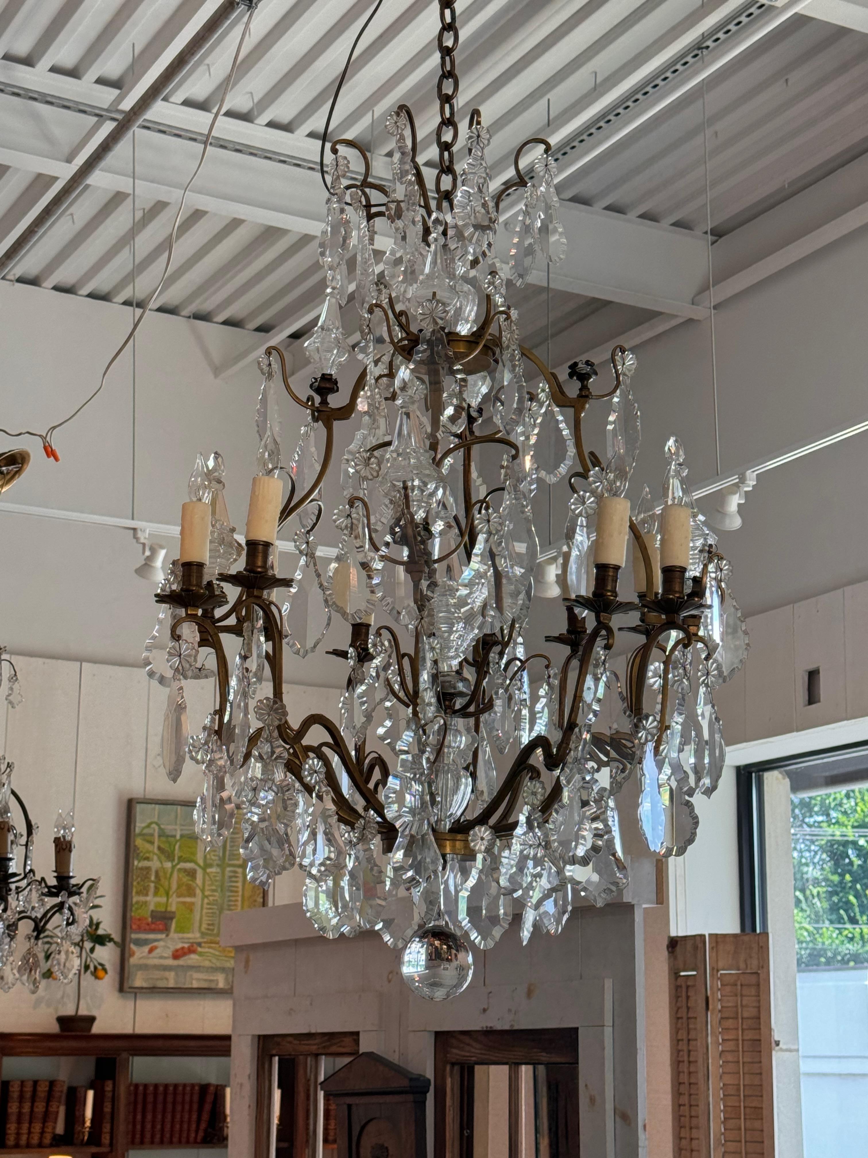 An impressive crystal chandelier. Vintage lighting makes all the difference in a room.