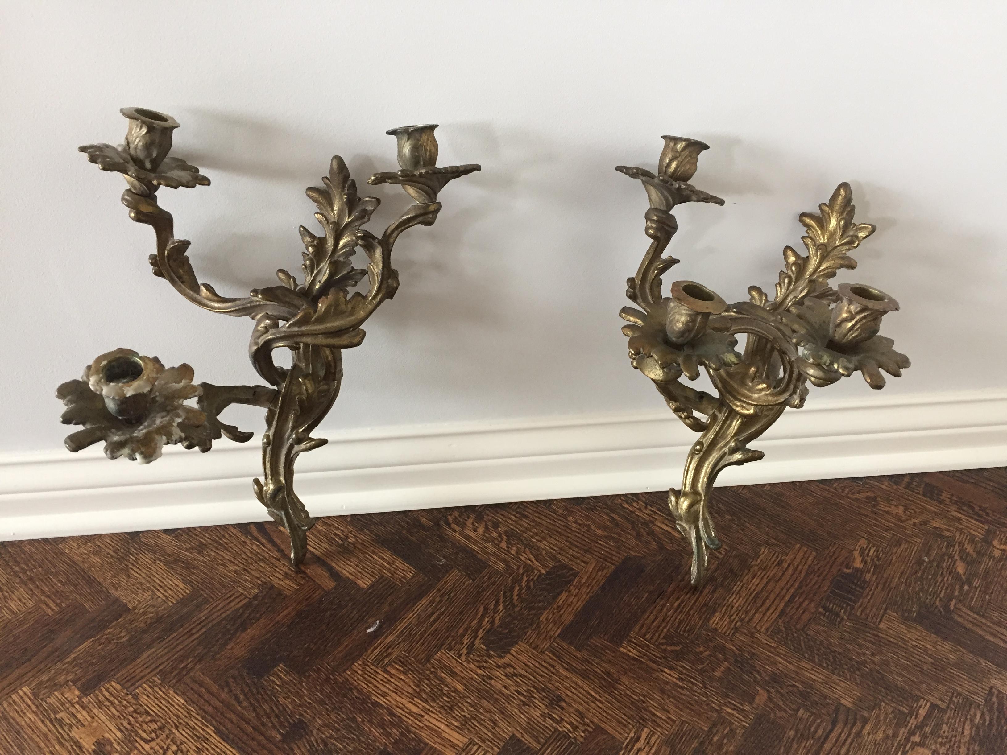 1920s bronze Italian 3-armed sconces, a pair
We purchased these incredible bronze candle sconces on a trip to Italy in the 1970s The shopkeeper told us they were from early 1900s. They are very heavy, due to solid construction. All three arms move