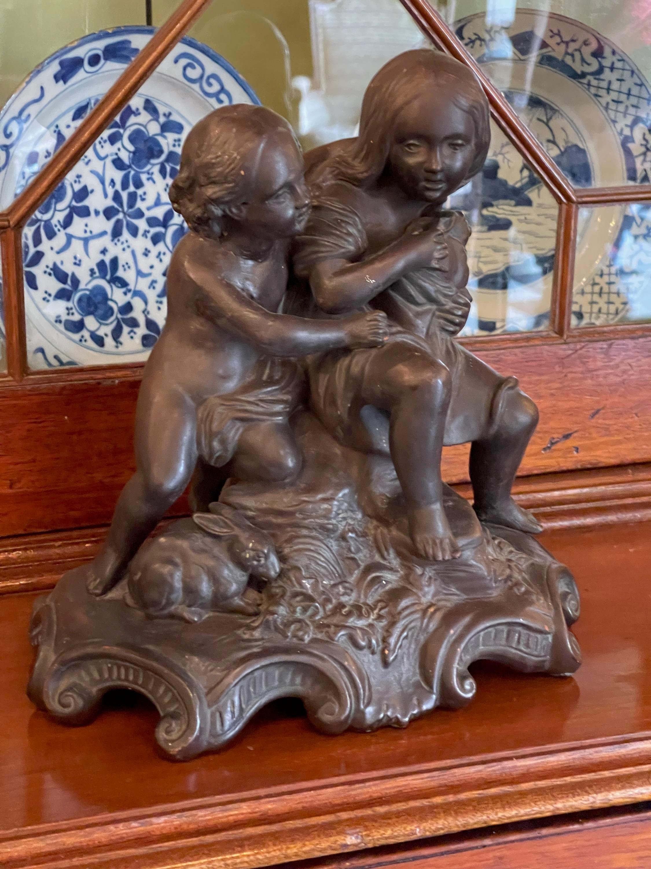 Early 20th Century 1920s Bronzed Sculpture of Children with Rabbits For Sale