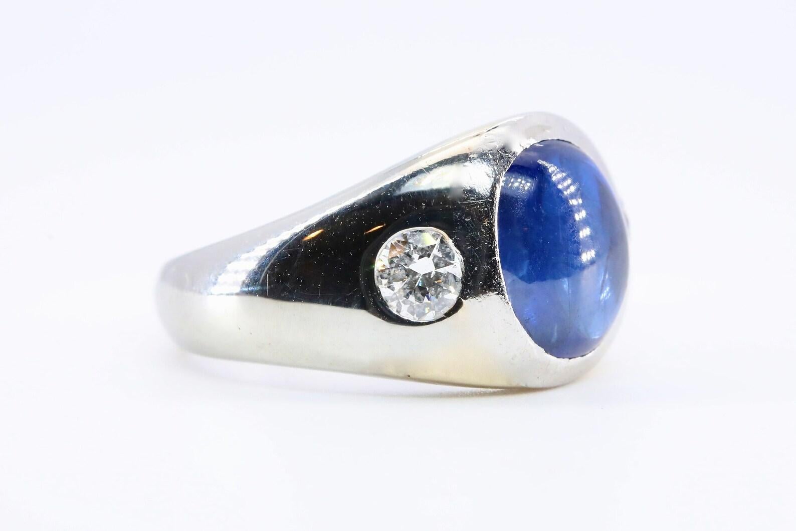 An Art Deco period Burma No Heat sapphire, and diamond ring set in platinum. Centering this ring is an impressive 5 carat No Heat sapphire of Burma origin. The sapphire comes with a GIA certificate, and has also received the rare and highly coveted