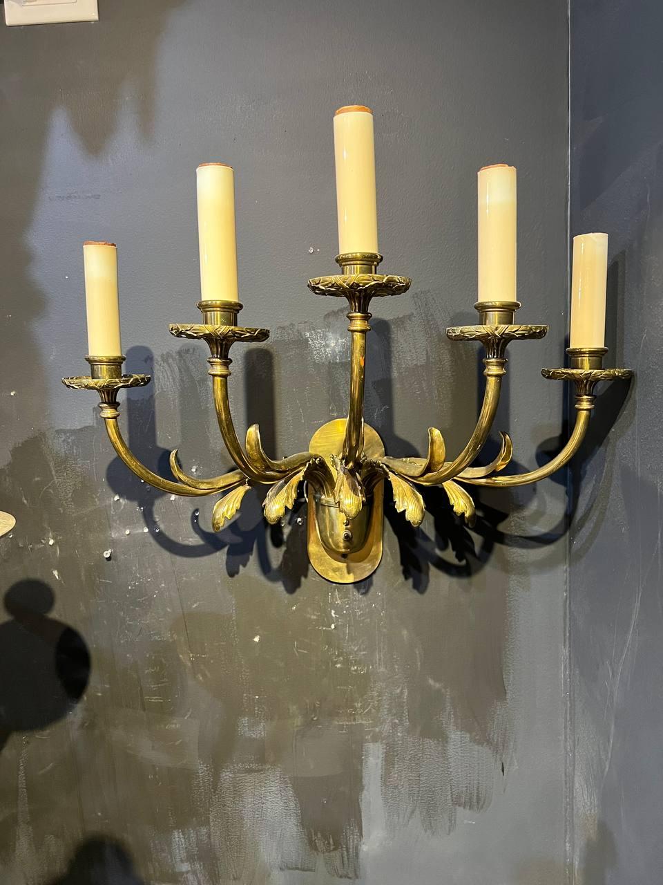 A pair of circa 1920's large Caldwell 5 lights bronze sconces with acanthus leaves 