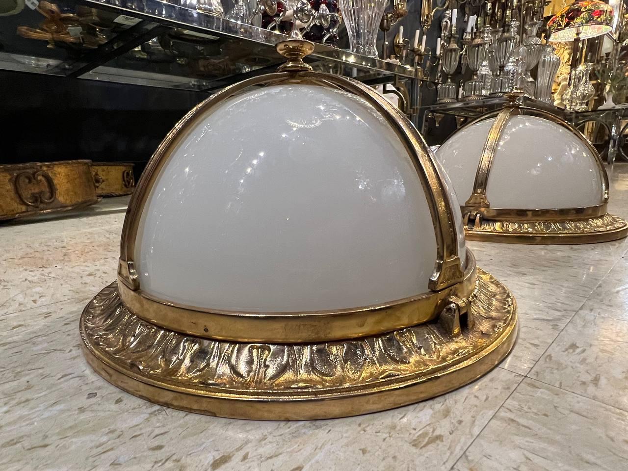 A circa 1920's Caldwell gilt bronze flush mounted light fixture with Opaline glass inset. From Waldorf Hotel NYC.