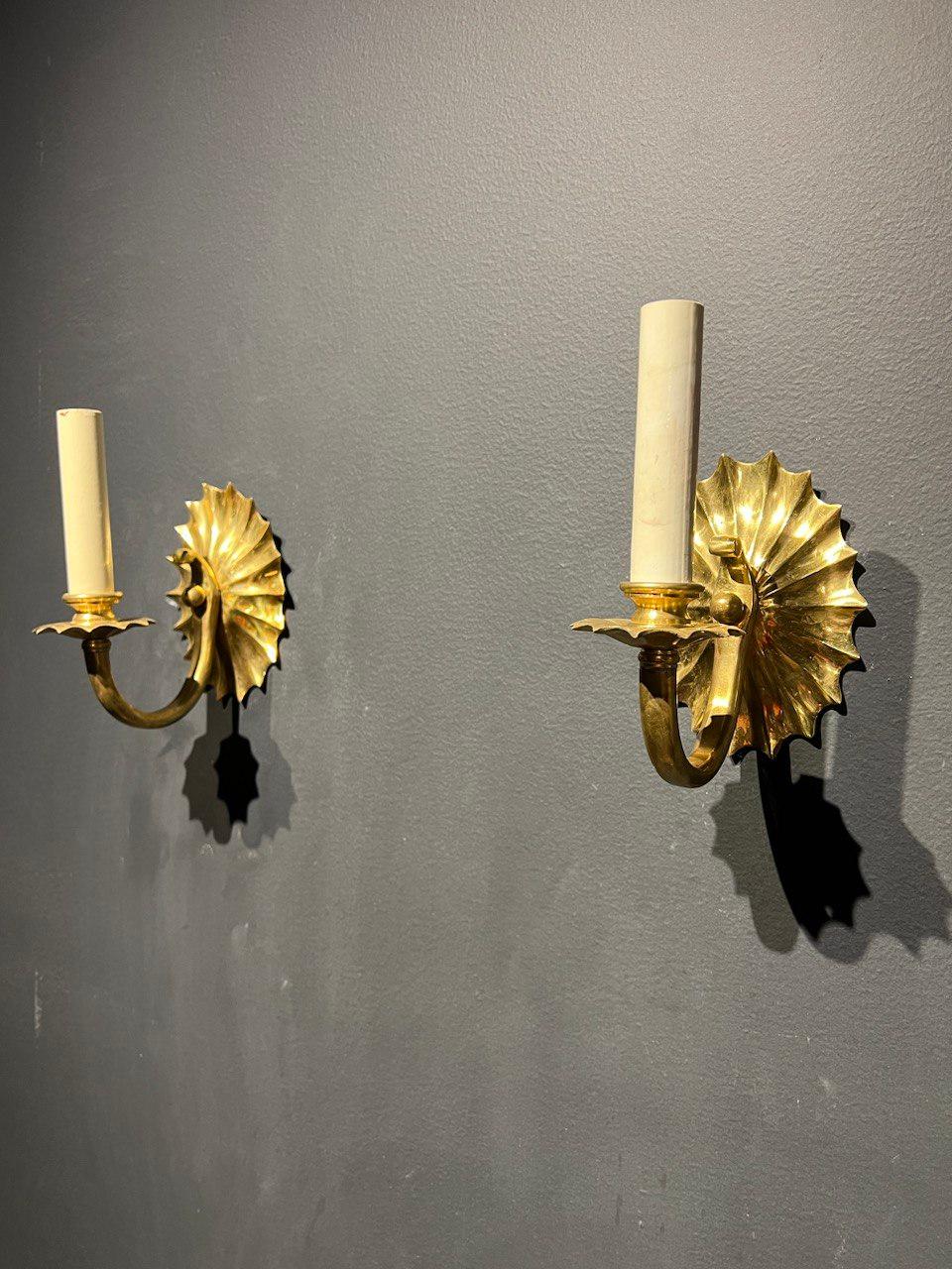 A pair of circa 1920’s Caldwell sconces with one light 